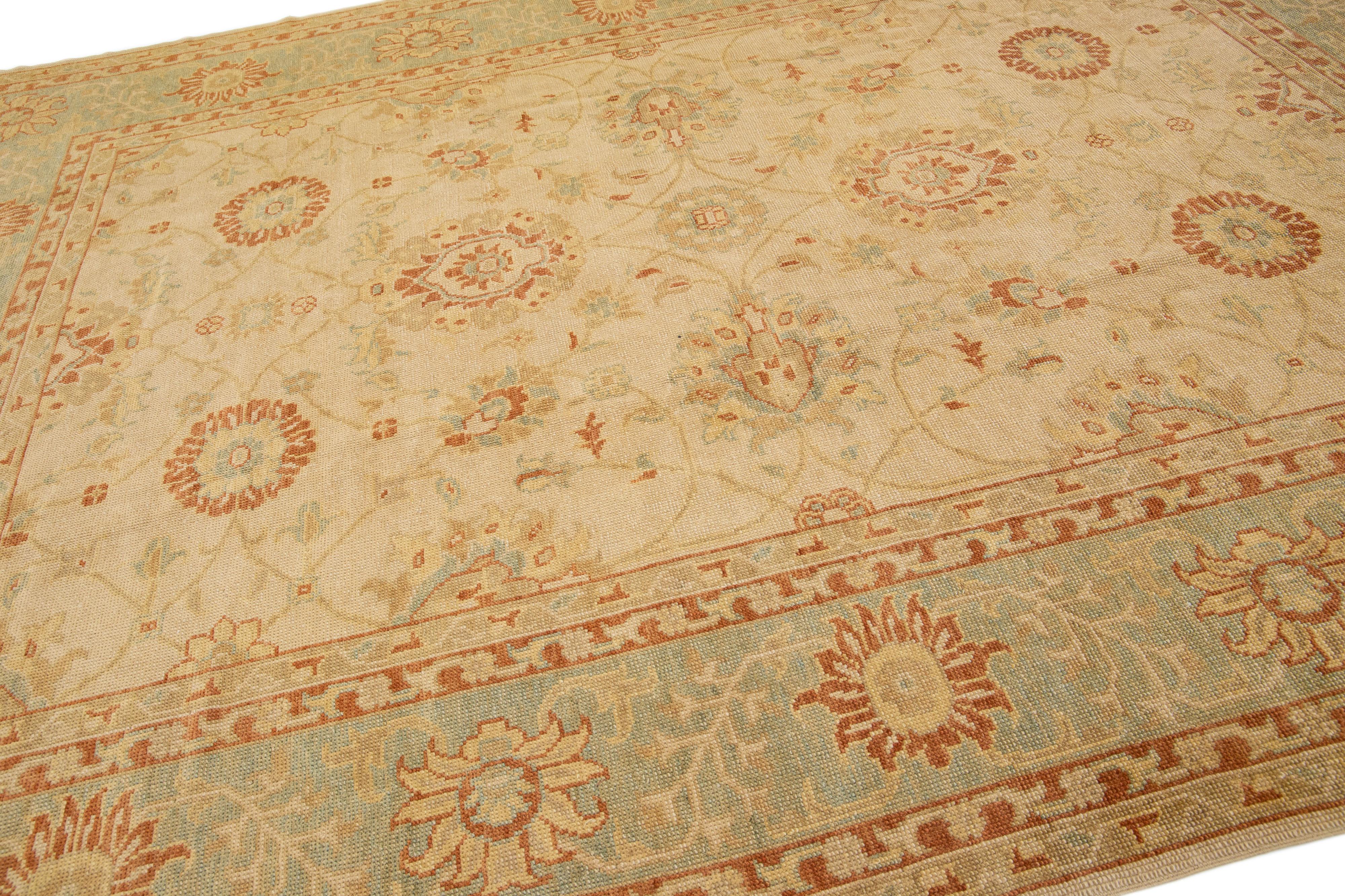 Oushak Handmade Modern Turkish Wool Rug with Tan Floral Field For Sale
