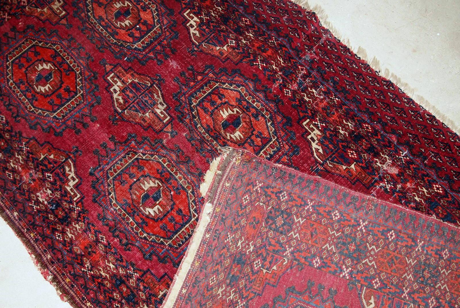 Handmade antique collectible Turkmen Saryk rug in scarlet shade. The rug is from the end of 19th century in original condition, it has some low pile and age wear.

- Condition: original, some low pile, age wear,

- circa 1880s

- Size: 2.6' x