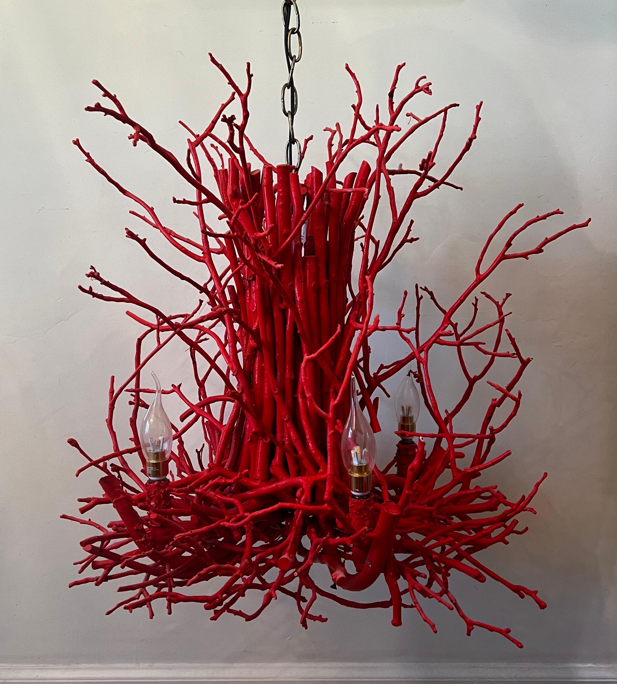 Handcrafted Custom Artisan hickory branch twig chandelier.   
Full with gnarly branching to give it an orderly but wild appearance.   4 lights are staggered in the lower portion of the fixture.  

Well suited for entry, powder room, dining or suite