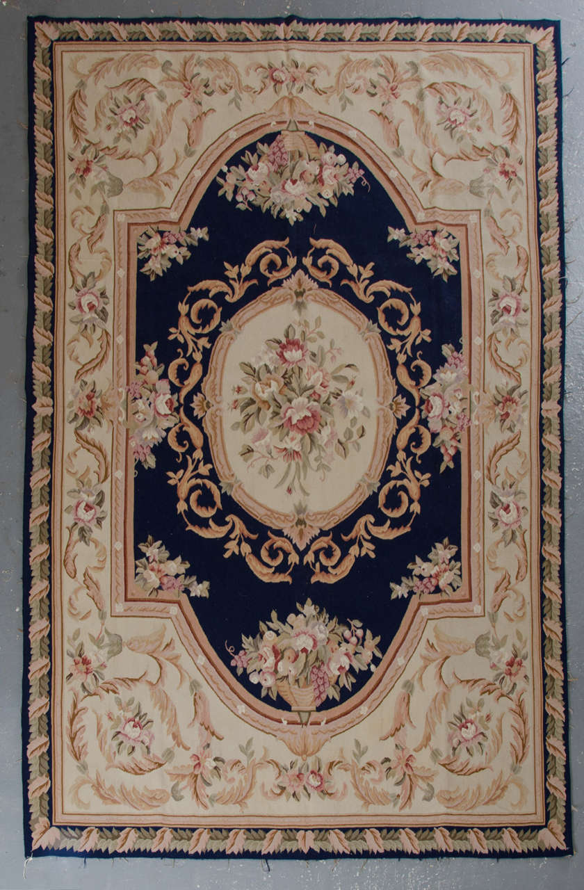 This navy beige rug is a very good item as living room rugs and getting most of the attention in the rug store by clients because of the color and design. These handmade elegant Chinese Aubusson floor rugs have the soft shade of colors. These luxury