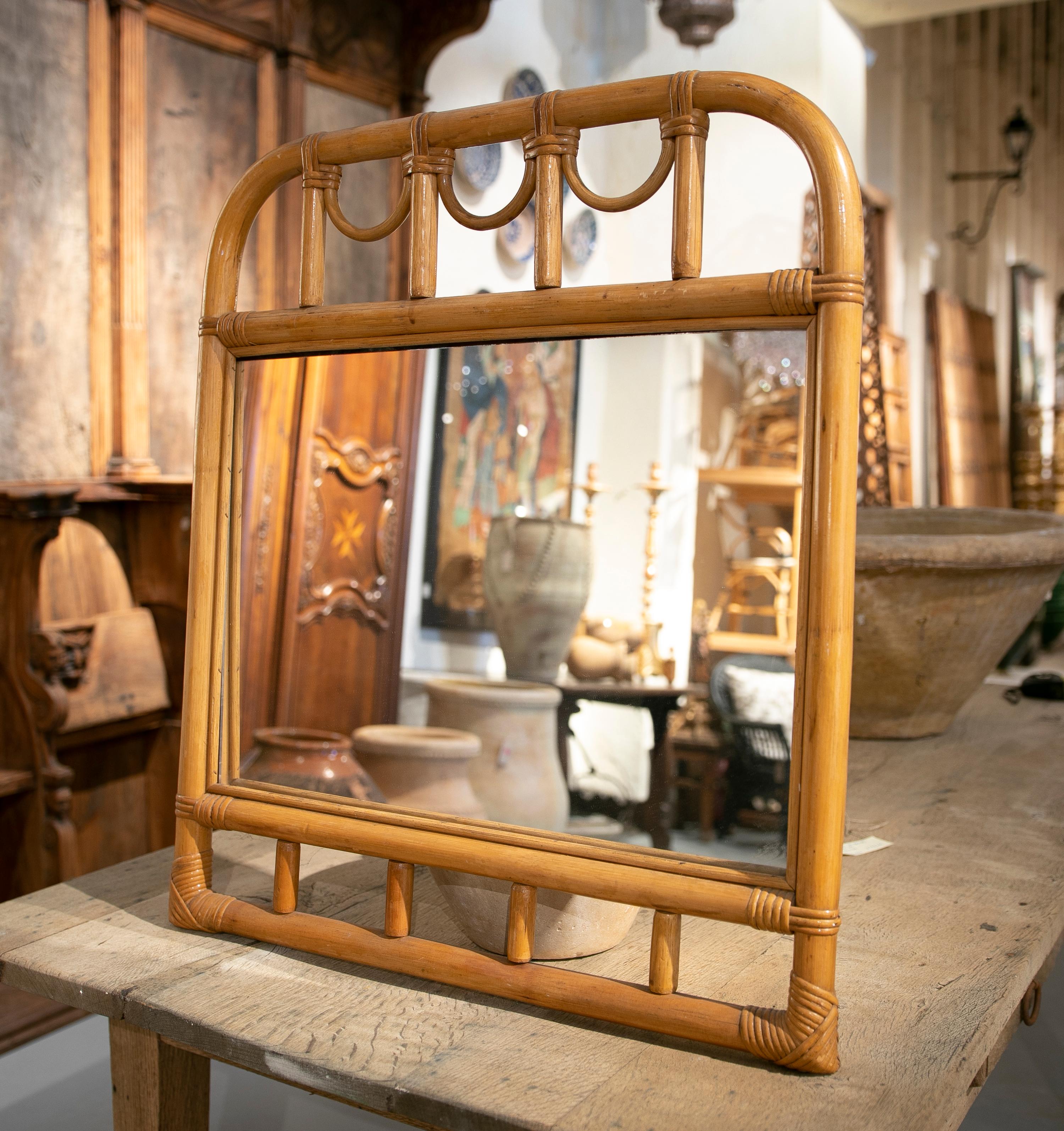 Handmade bamboo mirror.