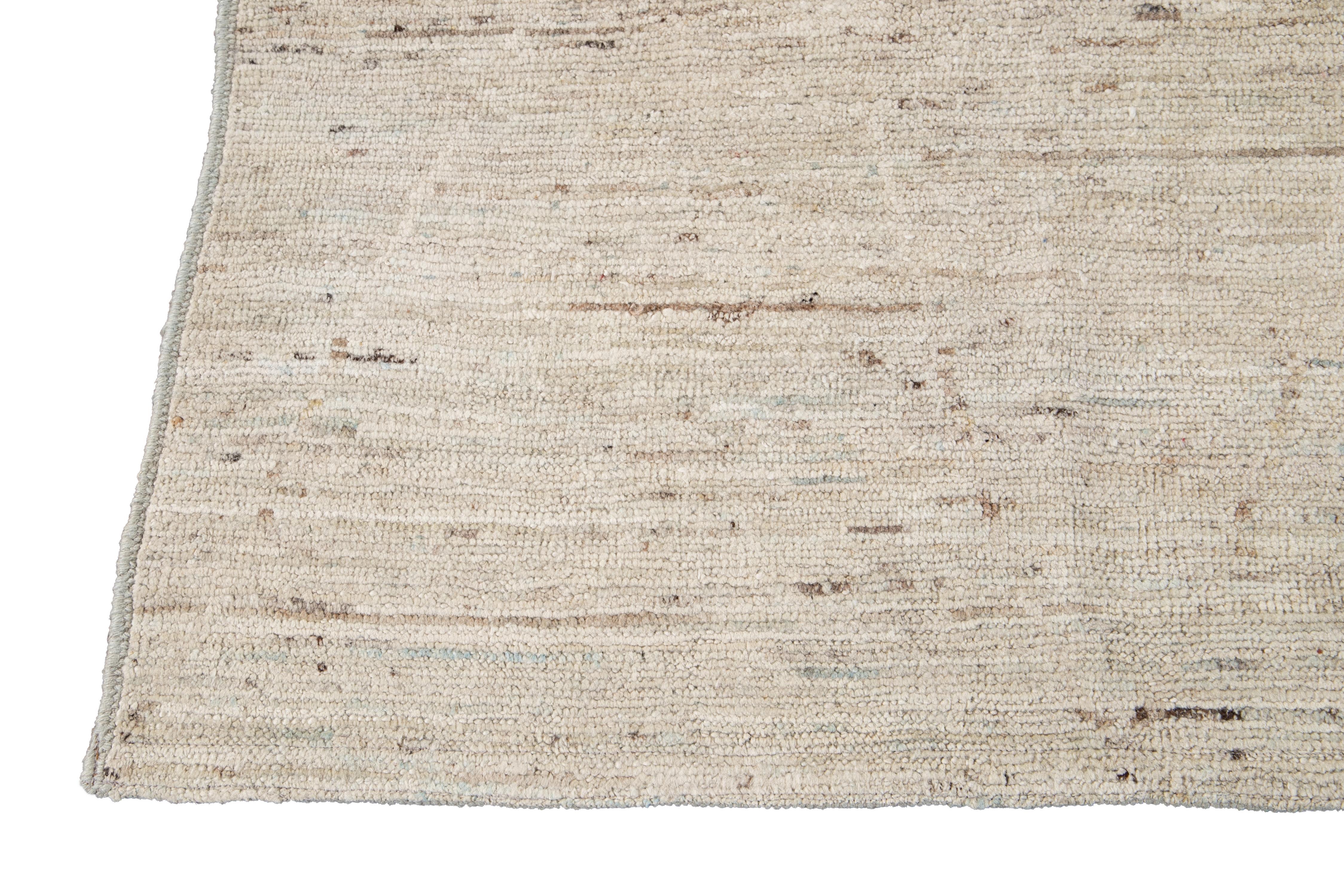 Hand-Knotted Handmade Beige Modern Moroccan Style Wool Rug With Minimalist Motif For Sale