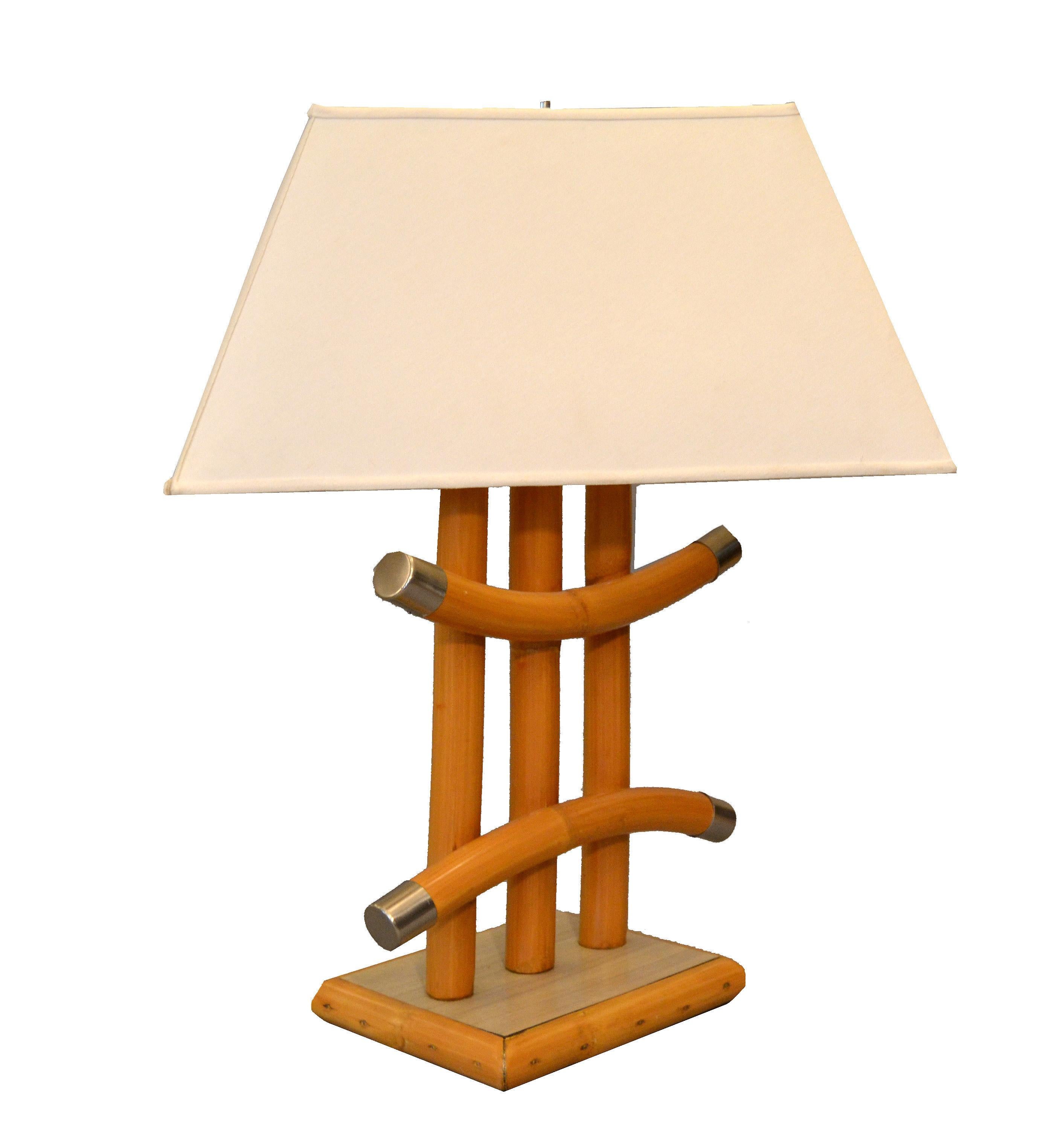 Mid-Century Modern Bohemian Chic handmade bent bamboo and rattan table lamp.
The original Off-White Shade is included.
Looks great from every angle and it is ready for any Tropical Living Space.