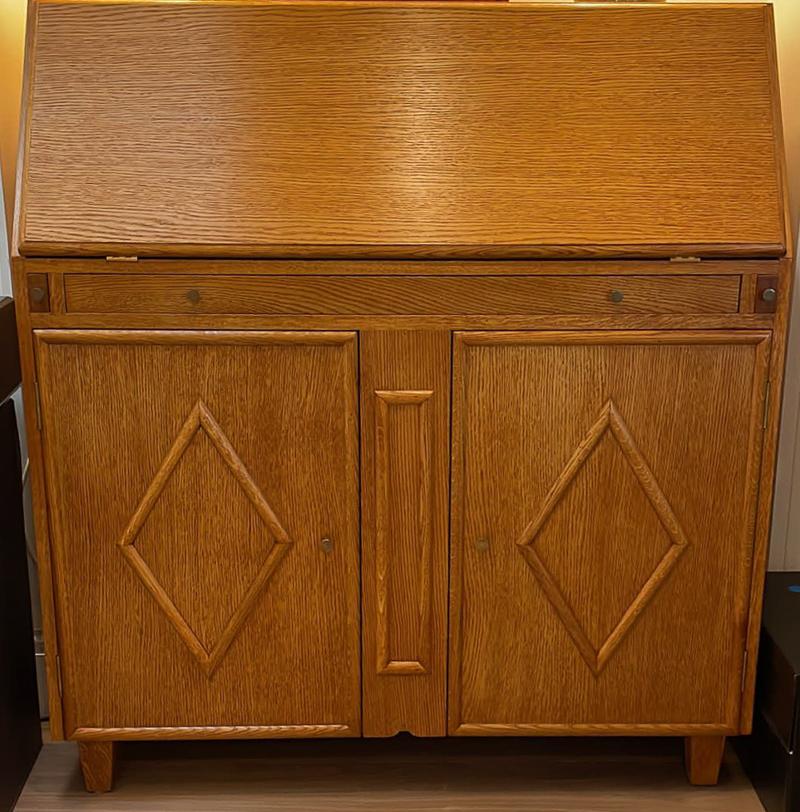 Bespoke desk chiffonier with a Mid-Century Modern danish feel custom designed by Swedish Interior Design and hand made by our master cabinet maker in the UK.

It features a flip down desk lid with supporting pullouts and 7 small pullout upper