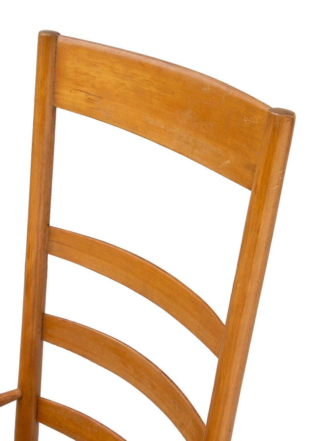 USA, 1940s
Handmade Birch Rocker with Woven Rush Seat. The details on this piece are subtle but beautiful. The curving back varies from ladder to ladder, the upright arm supports have a gently curving profile. The feel is classic Americana. Will add
