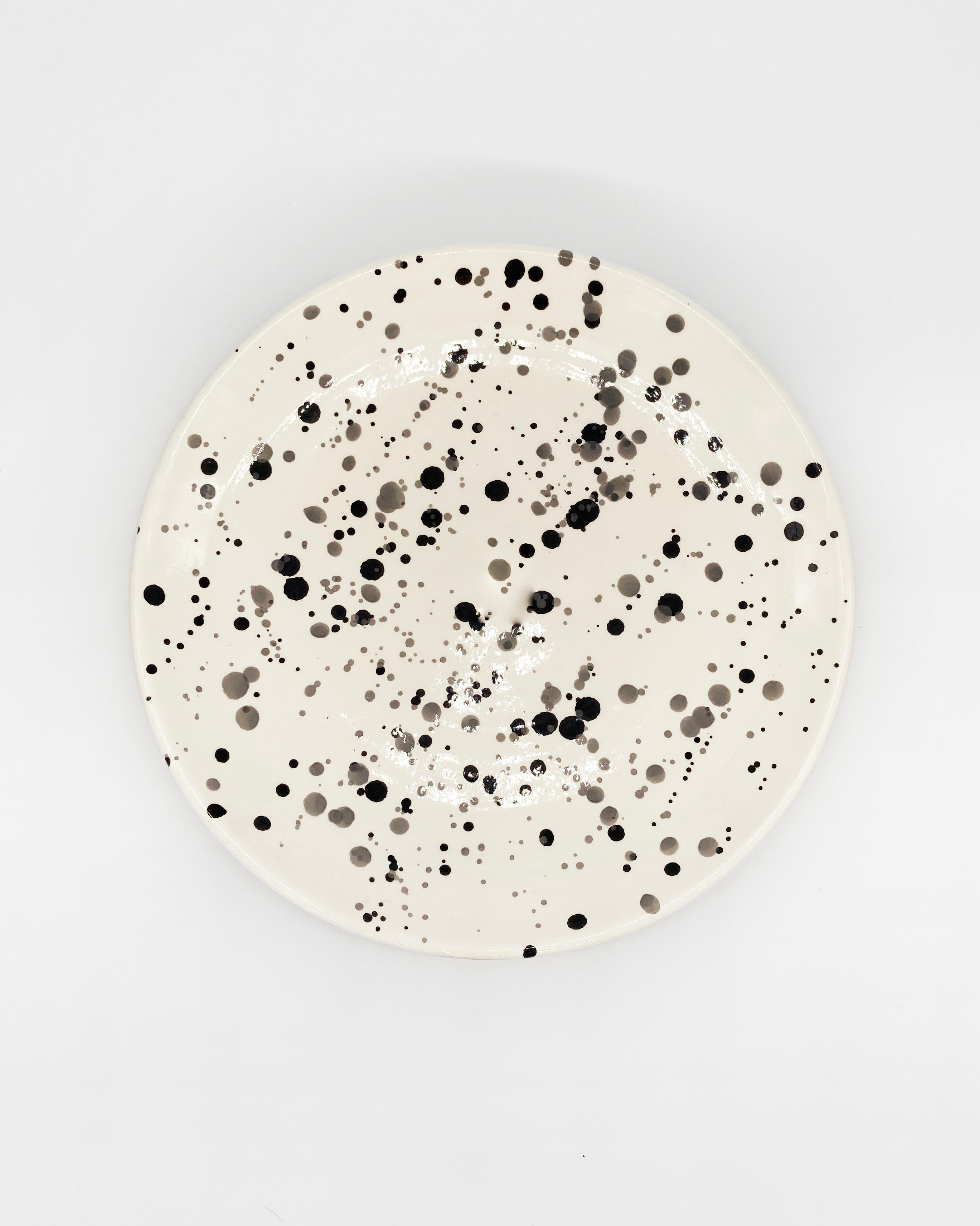 Handmade and hand-painted ceramics from one of the mother countries, Portugal, these beautiful pieces for your table will add a modern and graphic touch and are perfect to mix and match. These polkadot plates are available in dinner and salad plate