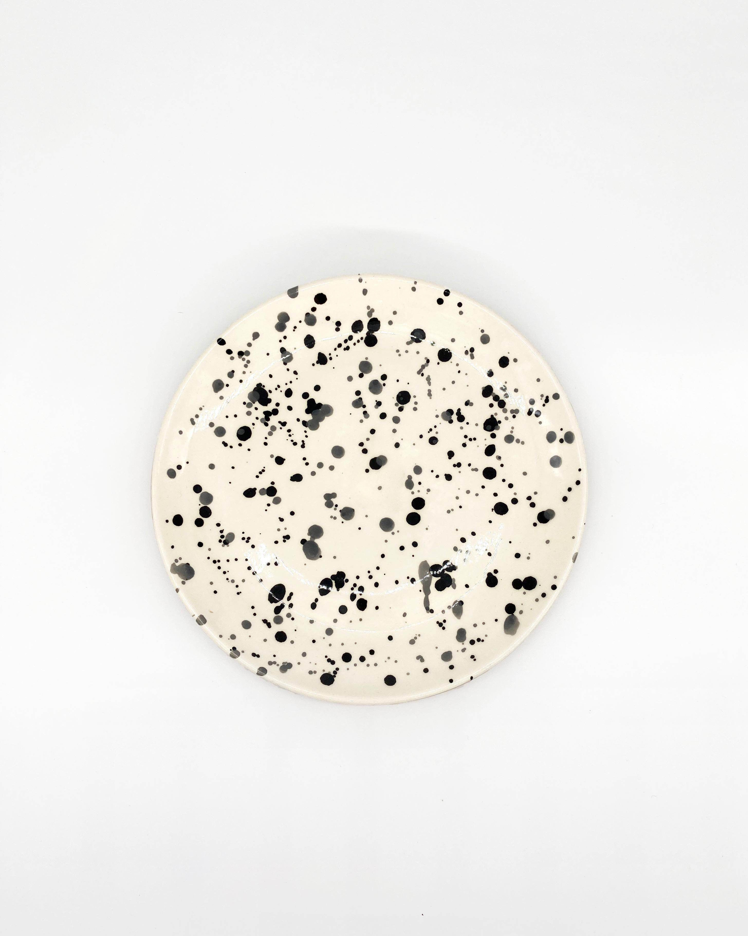 Handmade and hand-painted ceramics from one of the mother countries, Portugal, these beautiful pieces for your table will add a modern and graphic touch and are perfect to mix and match. These polkadot plates are available in dinner and salad plate