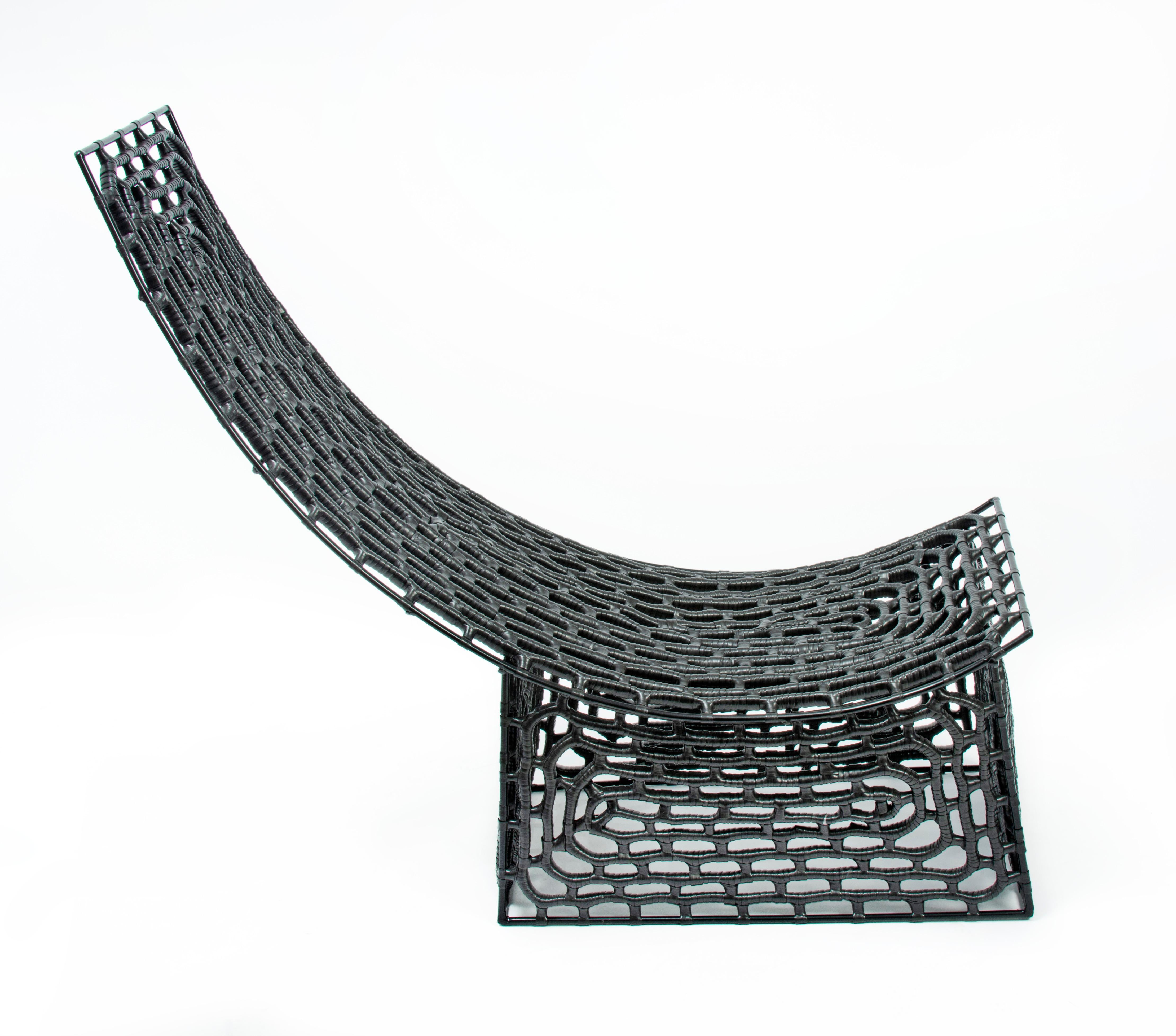 South African Modern Industrial Black Panther Chaise in Metal with Plastic Woven Seat For Sale