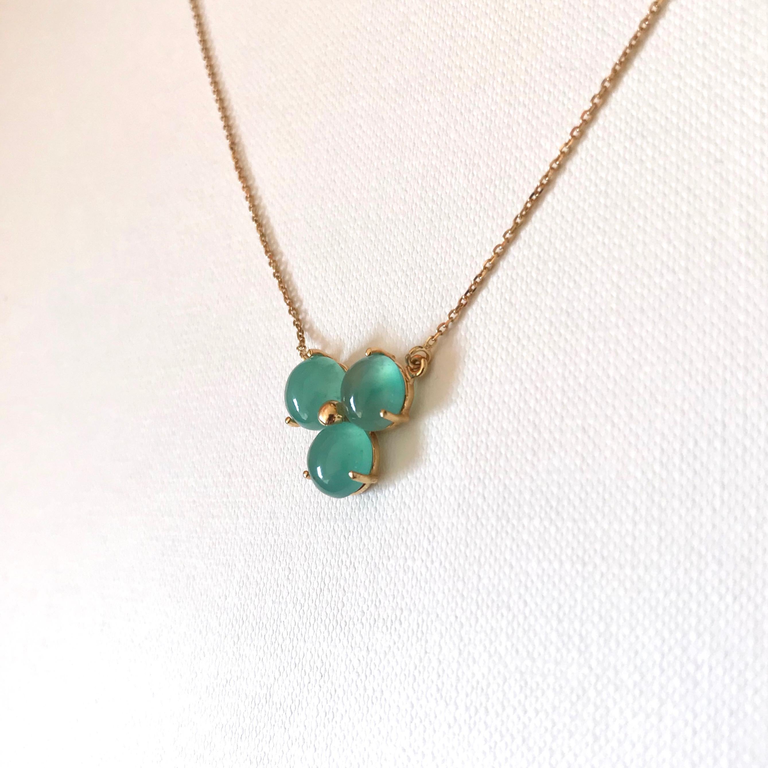 Handmade 18 karat solid yellow gold flower necklace with lovely blue-green cabochon cut Aquaprase (Chalcedony ) stones.
Flower's width: 16.00mm
Length: 40.00 – 42.00 cm ( two options )
Hallmark: London Goldsmiths’ Company –  Assay Office
All our
