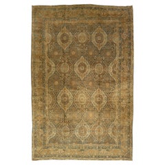 Tapis persan ancien Kerman bleu fait à la main avec un motif sur toute la surface