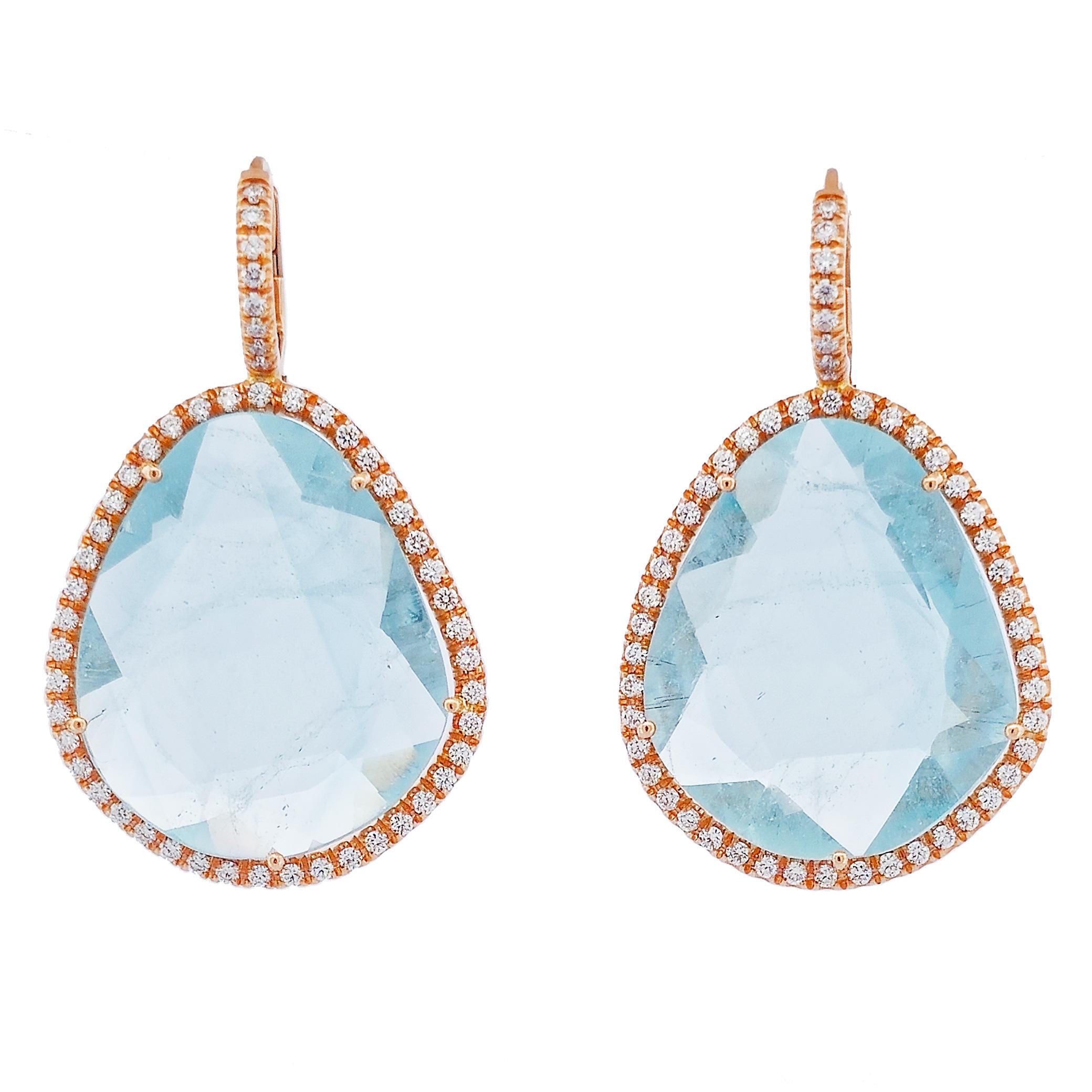 Revel in the rare beauty of these 18 karat rose gold, blue topaz, diamond pave drop earrings. 

They are handmade and one of a kind. 
Featuring magnificent large blue topaz slices that have a total weight of 51.65 carats. 

There is an additional