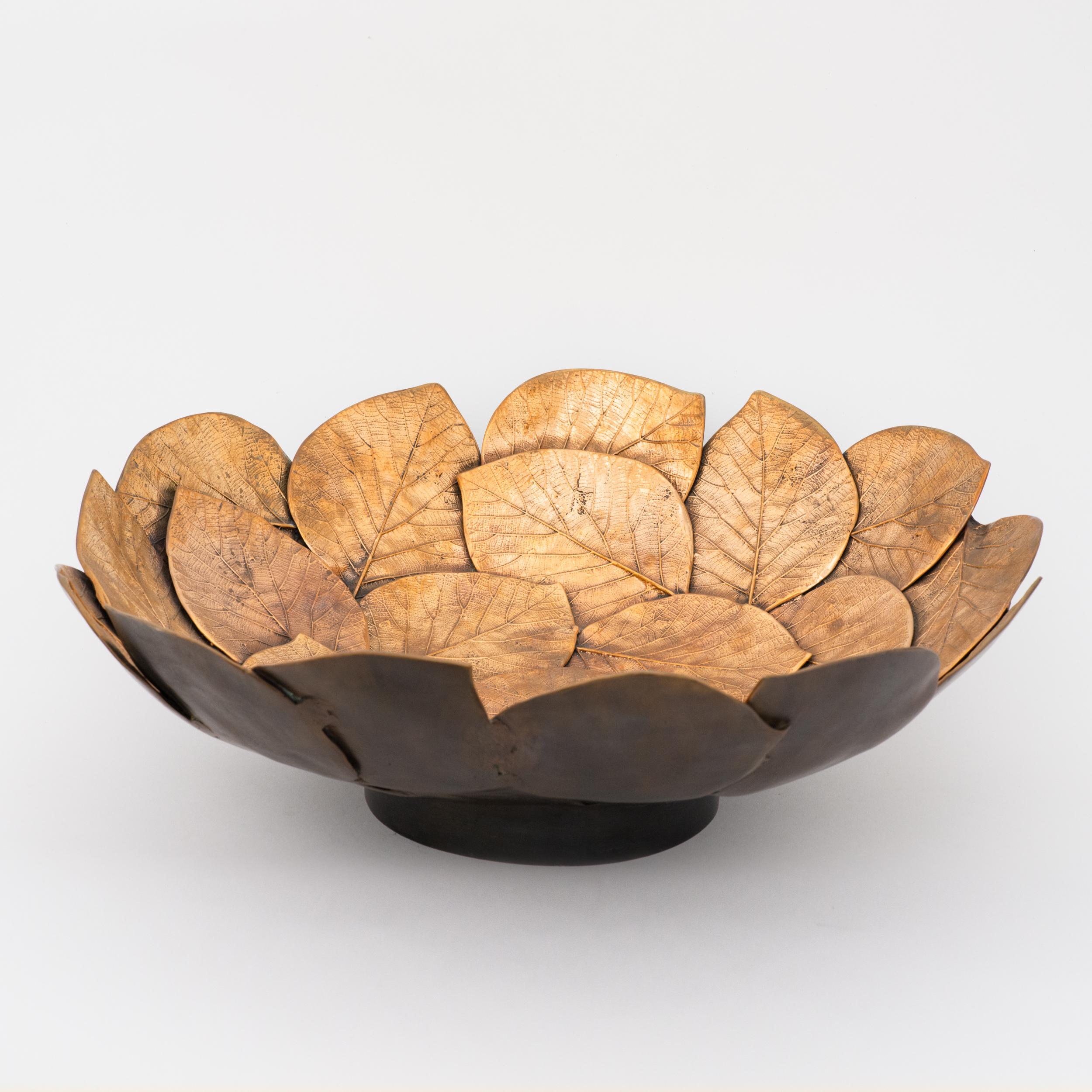 Unique and exquisite brass cast leaf decorative bowl (medium size). Handmade using highly skilled and specialised traditional processes to create an original and sumptuous piece.

Slight variations in the patina and polished finishes, patterns and