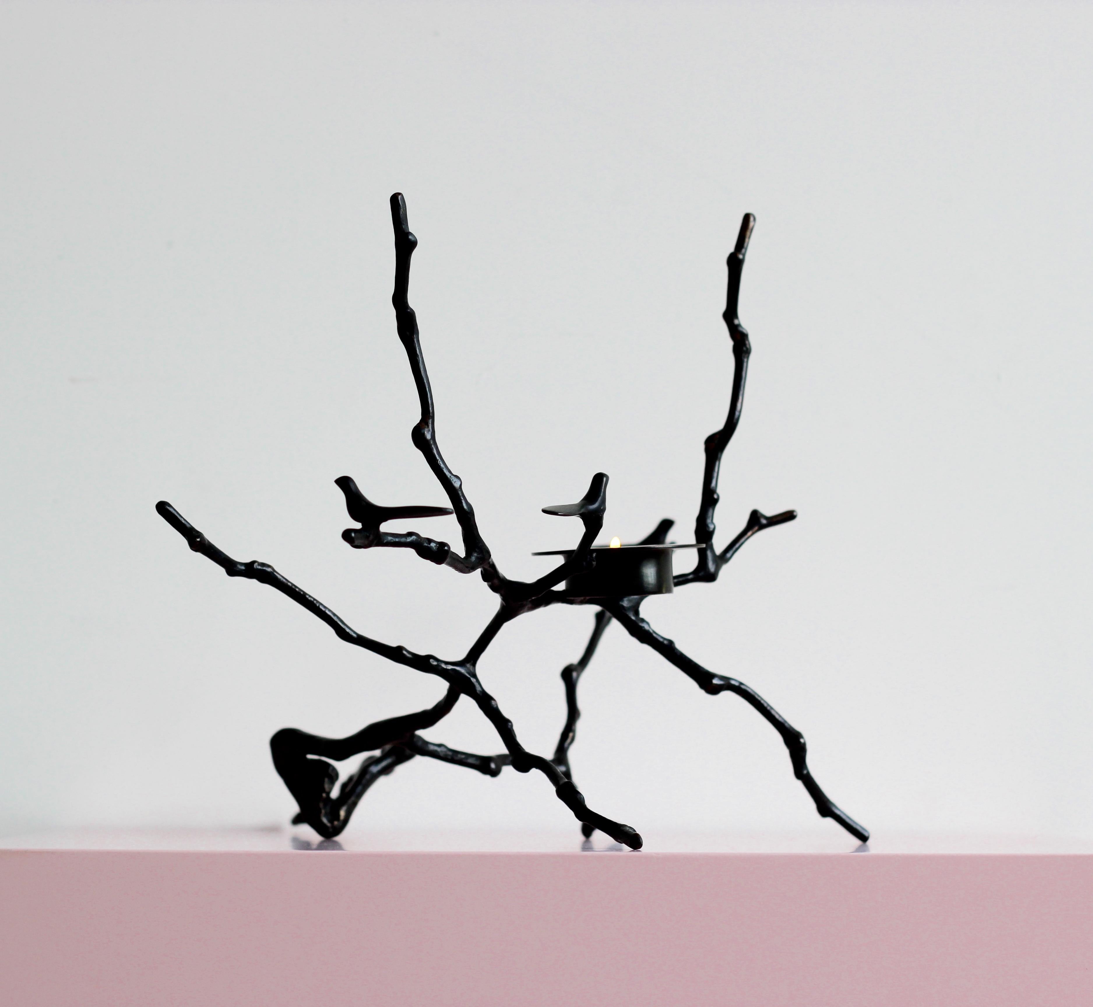 Original, unique and cast in bronze, creating sumptuous and unusual decorative elements for beautiful homes.

Each of these splendid bronze Magnolia twig t-light holders is handmade individually with incredible detail. Cast using very traditional