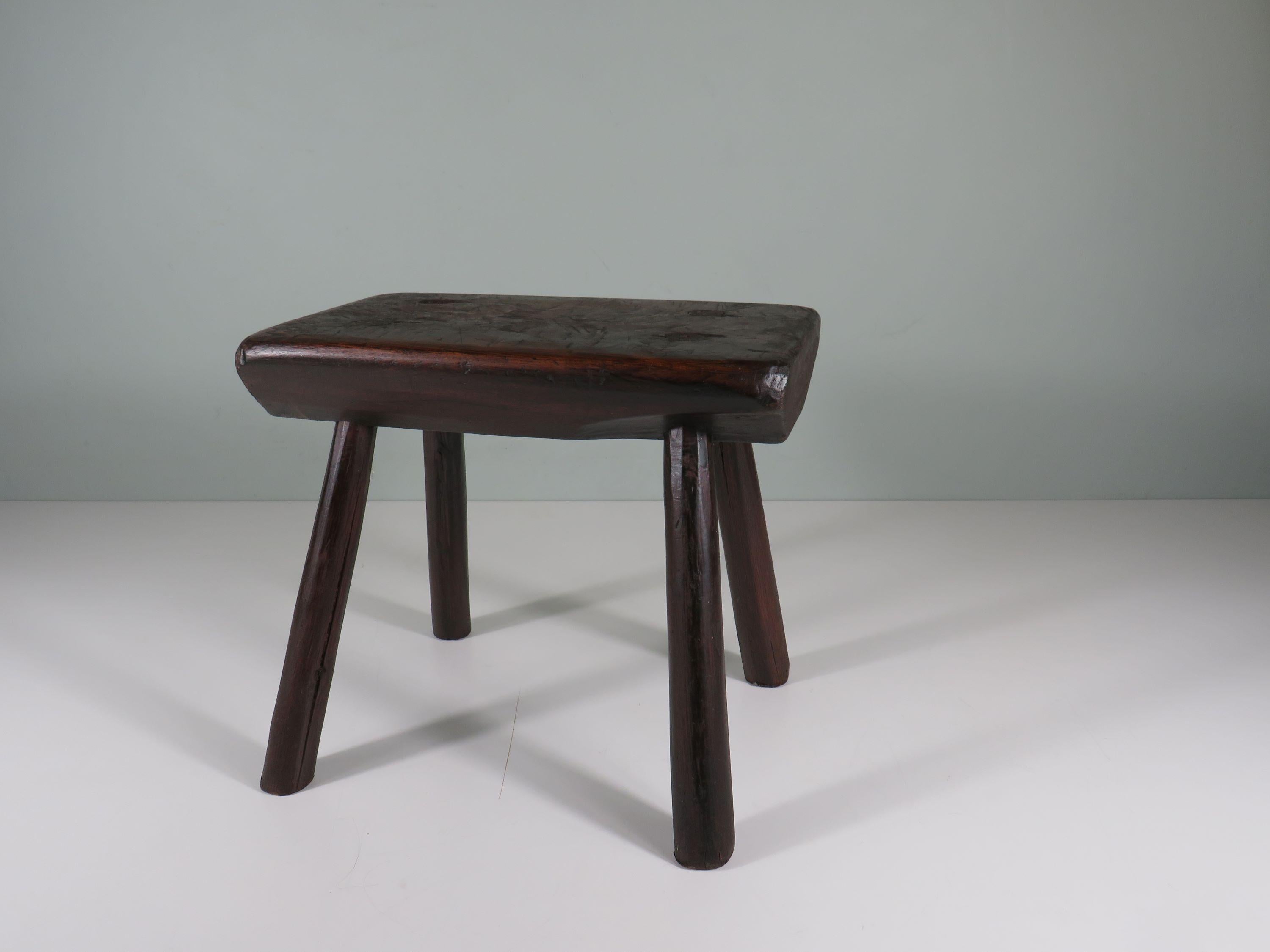 Oak Handmade brutalist low oak stool, mid 20th century For Sale