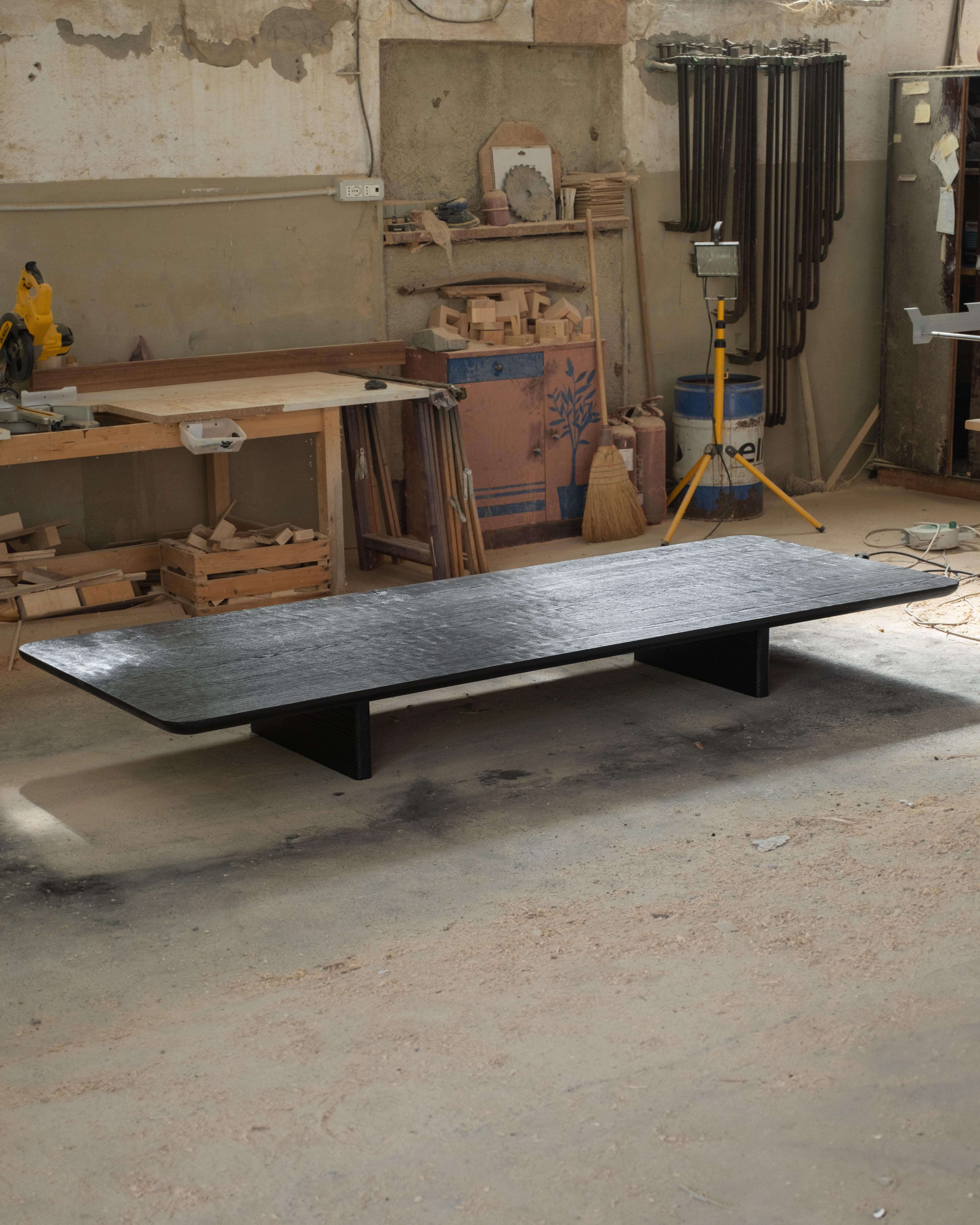 Handmade Burned European Oak Contemporary Low Coffee Table by Dennis Kaiser
Dimensions: D 120 x W 260 x H 35 cm.
Materials: European oak.

Handcrafted in Tuscany, Italy. Handmade from solid European oak, this table features a burned surface created
