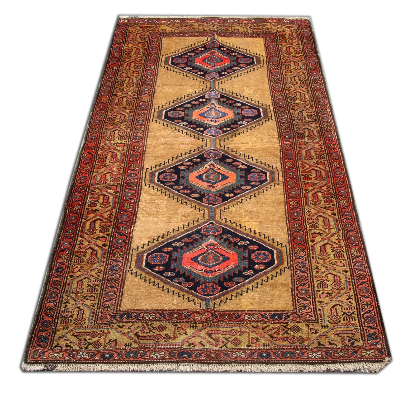 This beautiful Kazak rug features a central medallion design woven in accent colours of blue and red on a beige background. The design and colours used in the construction are unique to the area in which this rug was woven. The unique colour palette