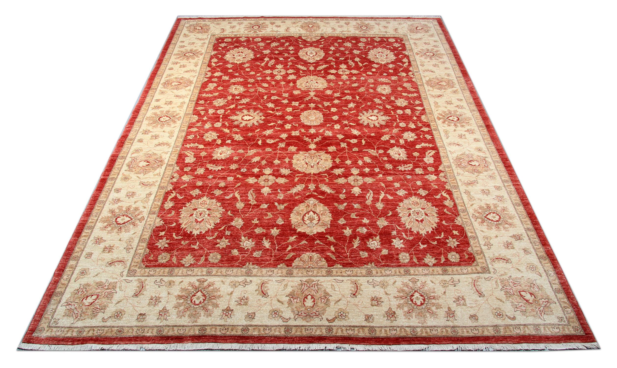 This traditional Ziegler rug is one of our more luxurious rugs made on looms by master weavers of Afghan rugs. This cream rug is made with or all handspun wool, the colours are produced from organic vegetable dyes. This carpet features an all-over