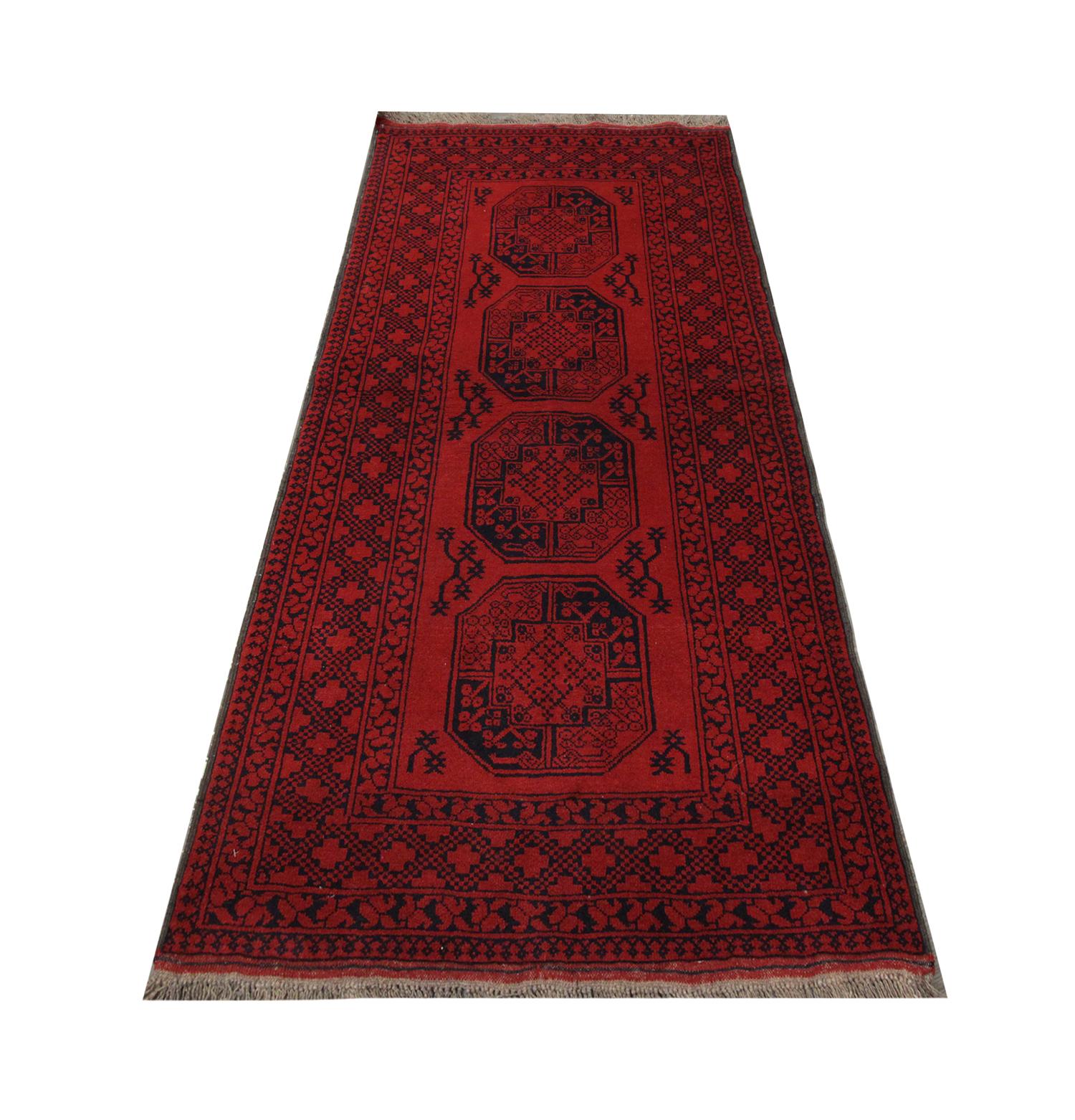 Style your floors with handmade carpet Oriental rug this high-quality vintage Afghan Turkmen tribal design rug, with a geometric symmetrical design, handwoven in 1970 with hand-spun, vegetable-dyed wool and cotton, by some of the finest artisans.