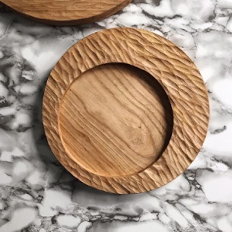 Hand carved wood from one of the mother countries, Portugal, these beautiful pieces for your table will add a rustic yet modern touch. Wood is Portuguese chestnut, expertly crafted by a third generation master wood carver. The black stained wood is