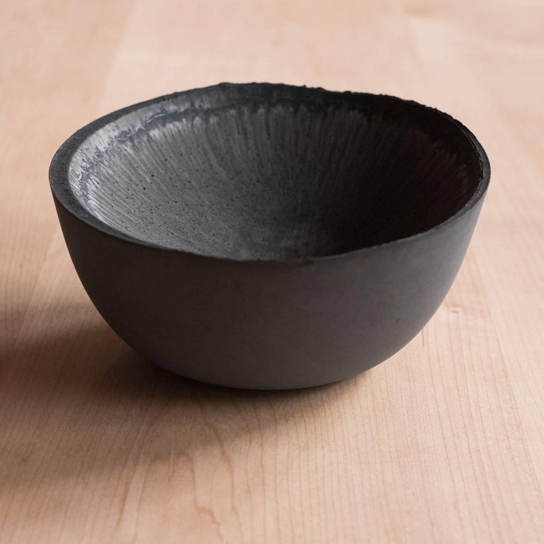 A collection of 236 unique bowls, the Concrete series by UMÉ Studio expresses the tension between heavy concrete and its delicate edge generated by hand pouring. While one assumes concrete should be strong and durable, it is, at its core, fragile.