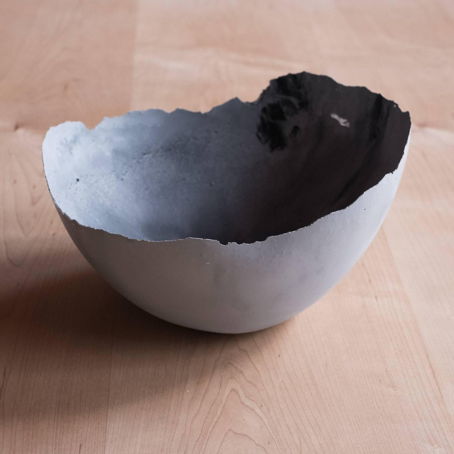 A collection of 236 unique bowls, the Concrete Series by UMÉ Studio expresses the tension between heavy concrete and its delicate edge generated by hand pouring. While one assumes concrete should be strong and durable, it is, at its core, fragile.