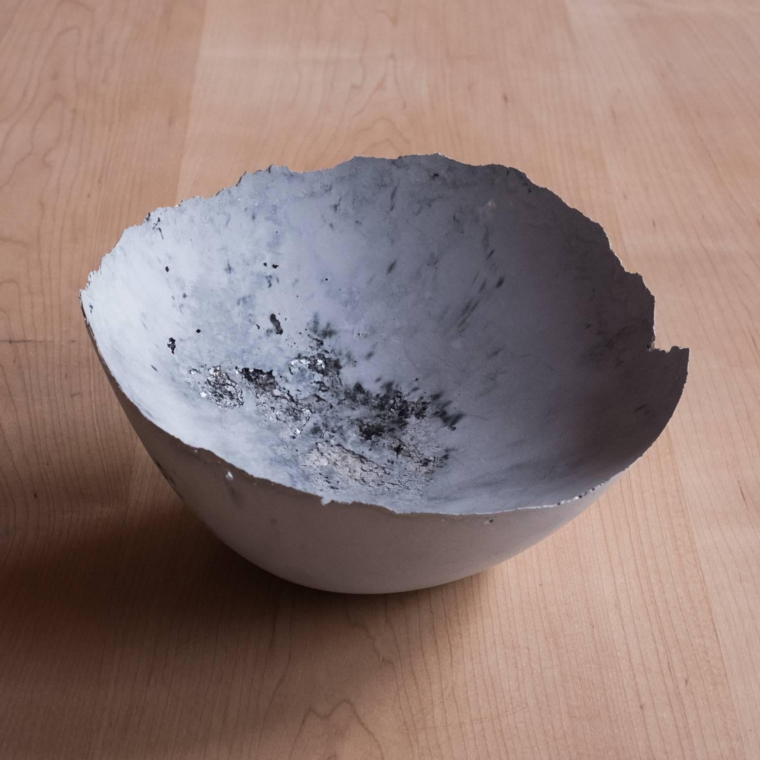 A collection of 236 unique bowls, the Concrete Series by UMÉ Studio expresses the tension between heavy concrete and its delicate edge generated by hand pouring. While one assumes concrete should be strong and durable, it is, at its core, fragile.