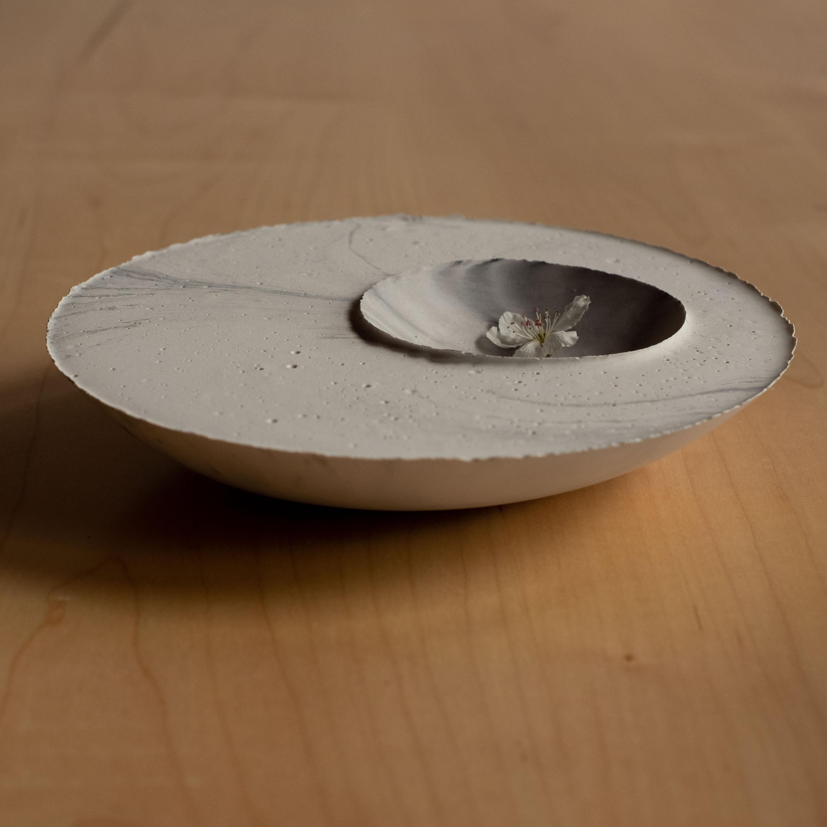 An edition of 150 unique bowls, the Concrete Series by UMÉ Studio expresses the tension between heavy concrete and its delicate edge generated by hand pouring. While one assumes concrete should be strong and durable, it is, at its core, fragile.