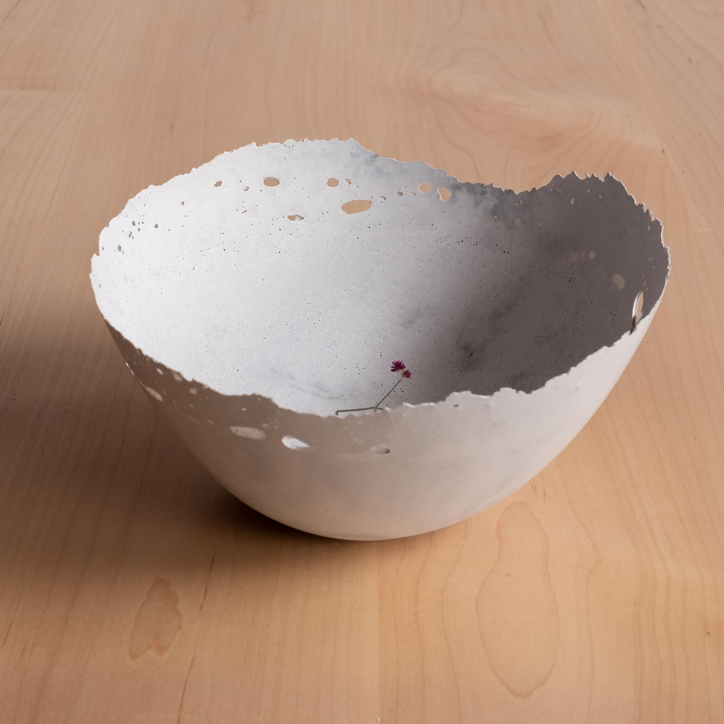 An edition of 150 unique bowls, the Concrete Series by UMÉ Studio expresses the tension between heavy concrete and its delicate edge generated by hand pouring. While one assumes concrete should be strong and durable, it is, at its core, fragile.