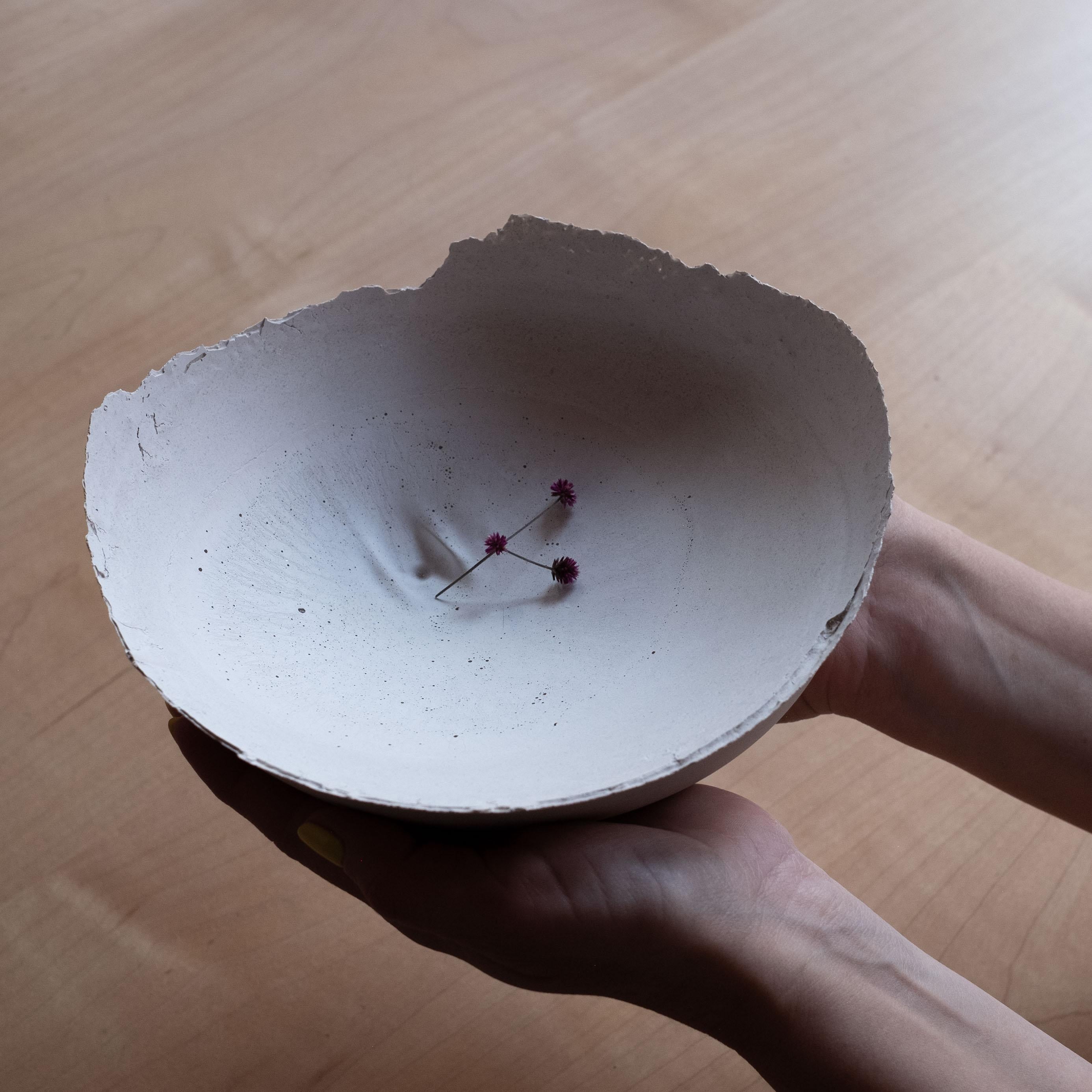 An edition of 150 unique bowls, the Concrete Series by UMÉ Studio expresses the tension between heavy concrete and its delicate edge generated by hand pouring. While one assumes concrete should be strong and durable, it is, at its core, fragile.