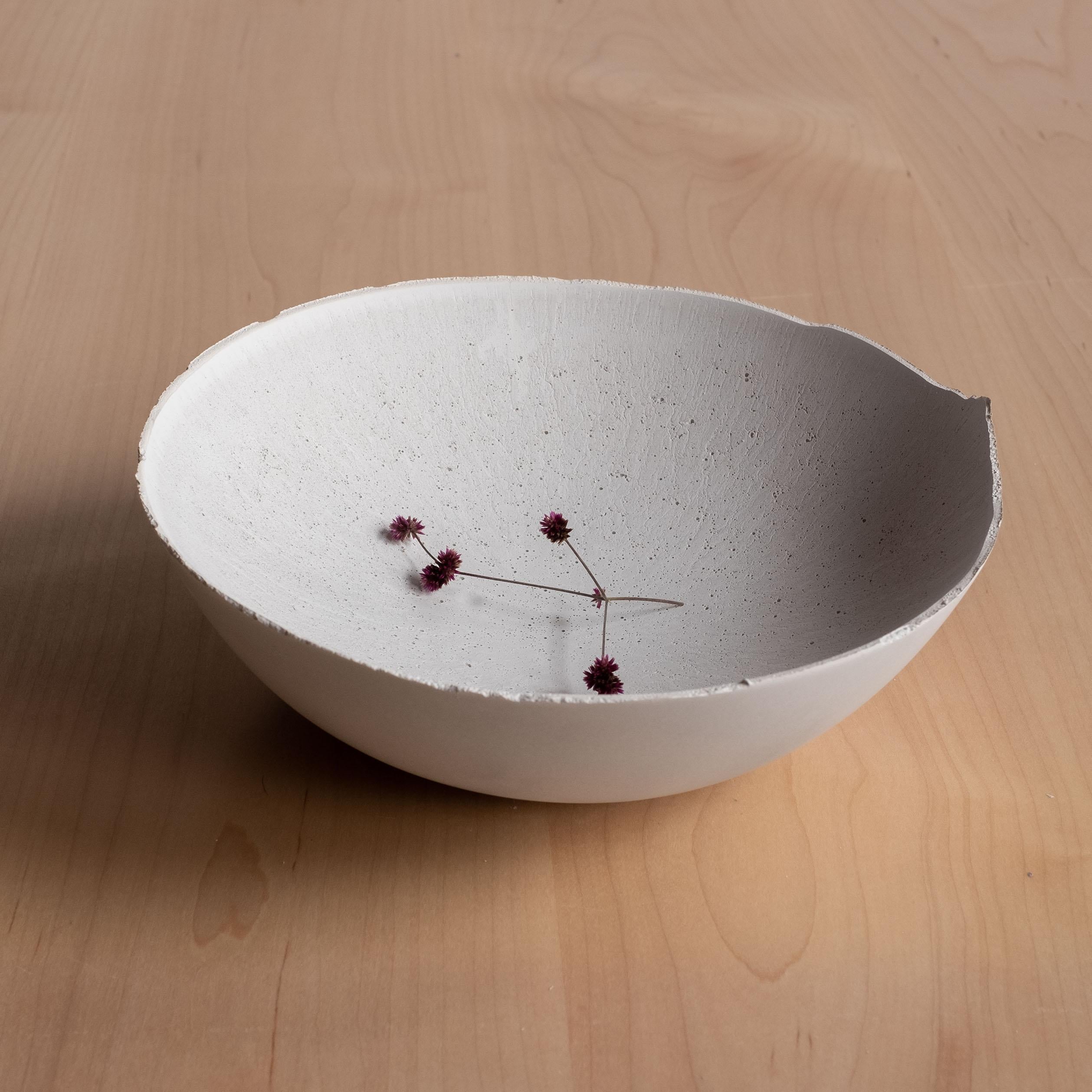 An edition of 150 unique bowls, the concrete Series by UMÉ Studio expresses the tension between heavy concrete and its delicate edge generated by hand pouring. While one assumes concrete should be strong and durable, it is, at its core, fragile.