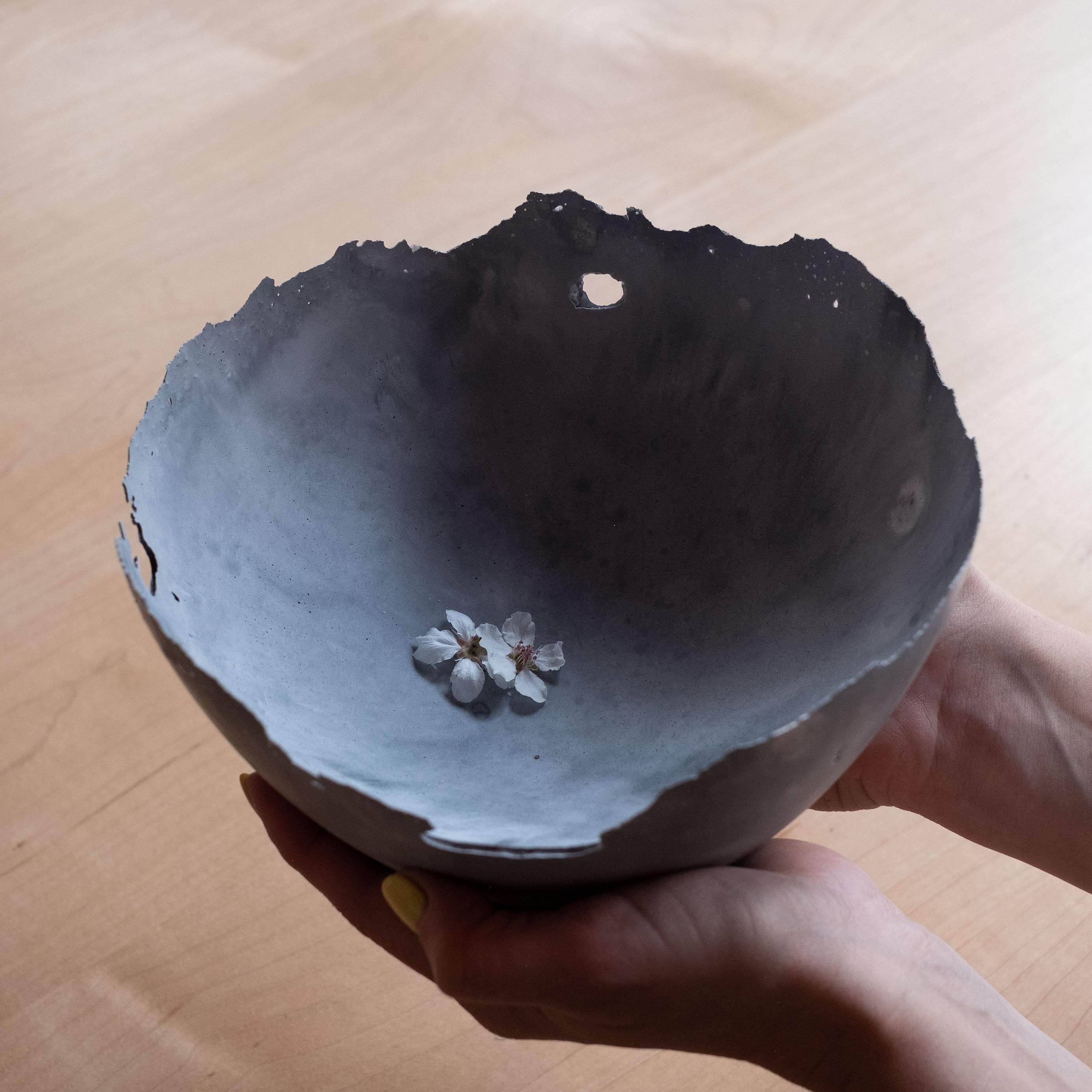 An edition of 150 unique bowls, the concrete Series by UMÉ Studio expresses the tension between heavy concrete and its delicate edge generated by hand pouring. While one assumes concrete should be strong and durable, it is, at its core, fragile.