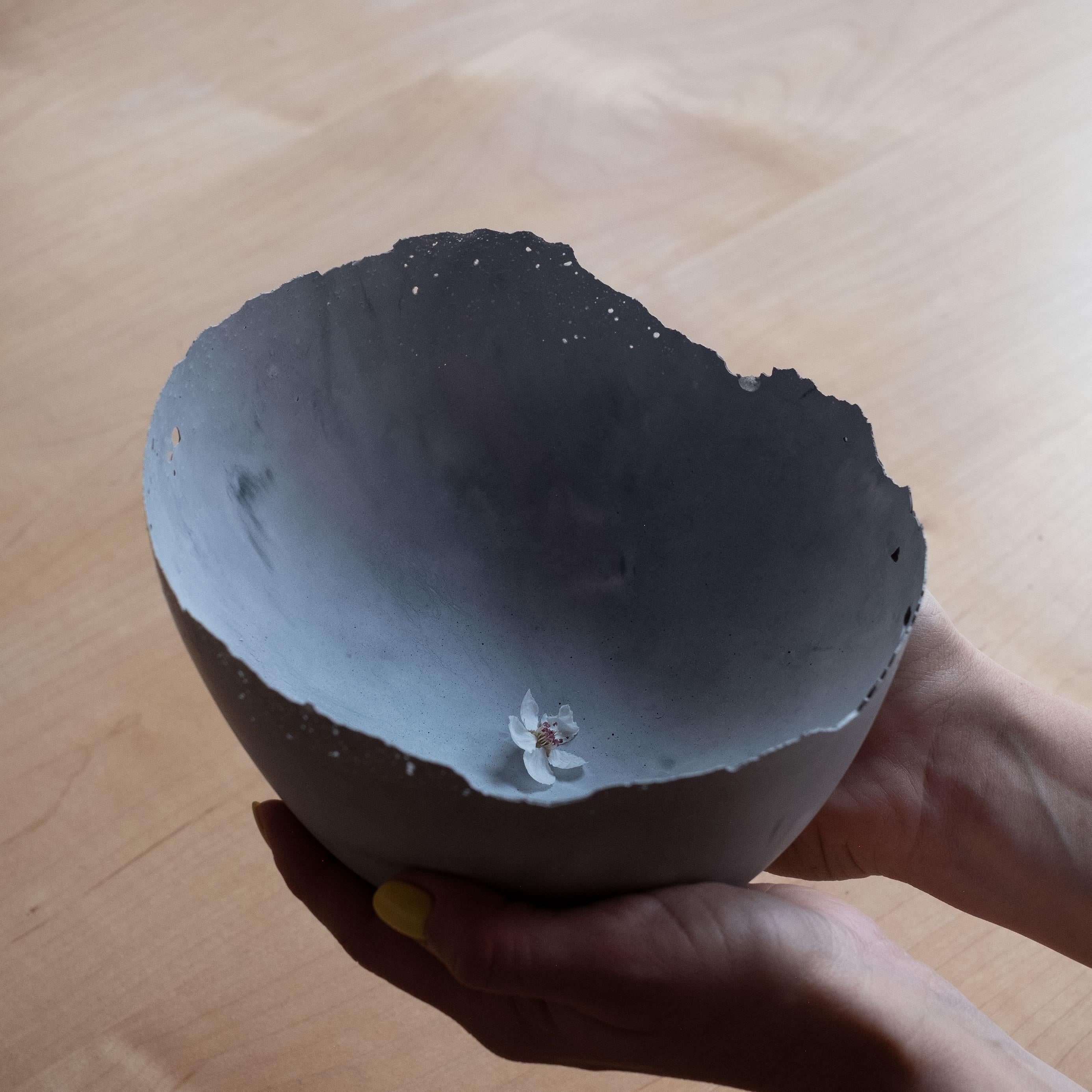 An edition of 150 unique bowls, the concrete Series by UMÉ Studio expresses the tension between heavy concrete and its delicate edge generated by hand pouring. While one assumes concrete should be strong and durable, it is, at its core, fragile.