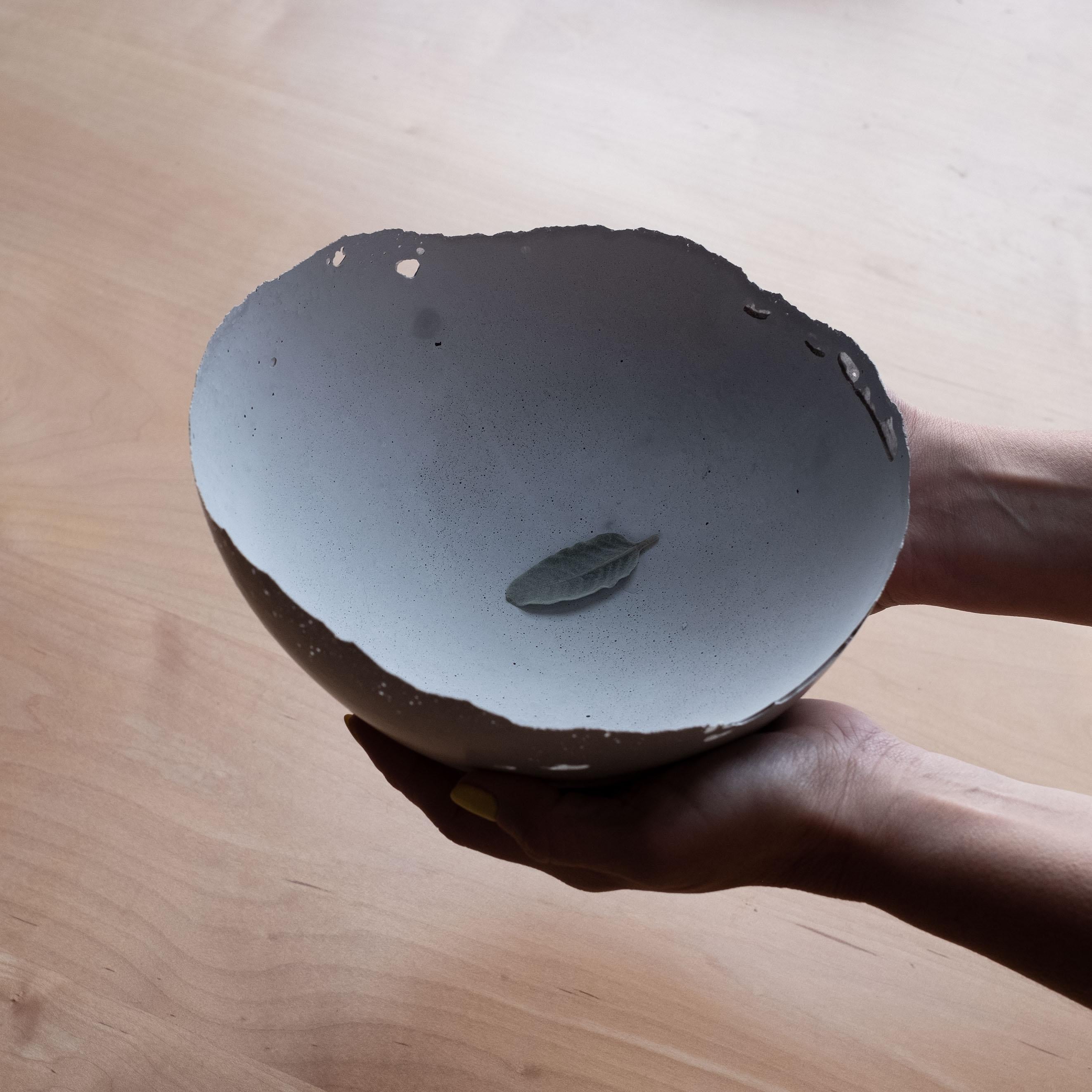 An edition of 150 unique bowls, the concrete Series by UMÉ Studio expresses the tension between heavy concrete and its delicate edge generated by hand pouring. While one assumes concrete should be strong and durable, it is, at its core, fragile.