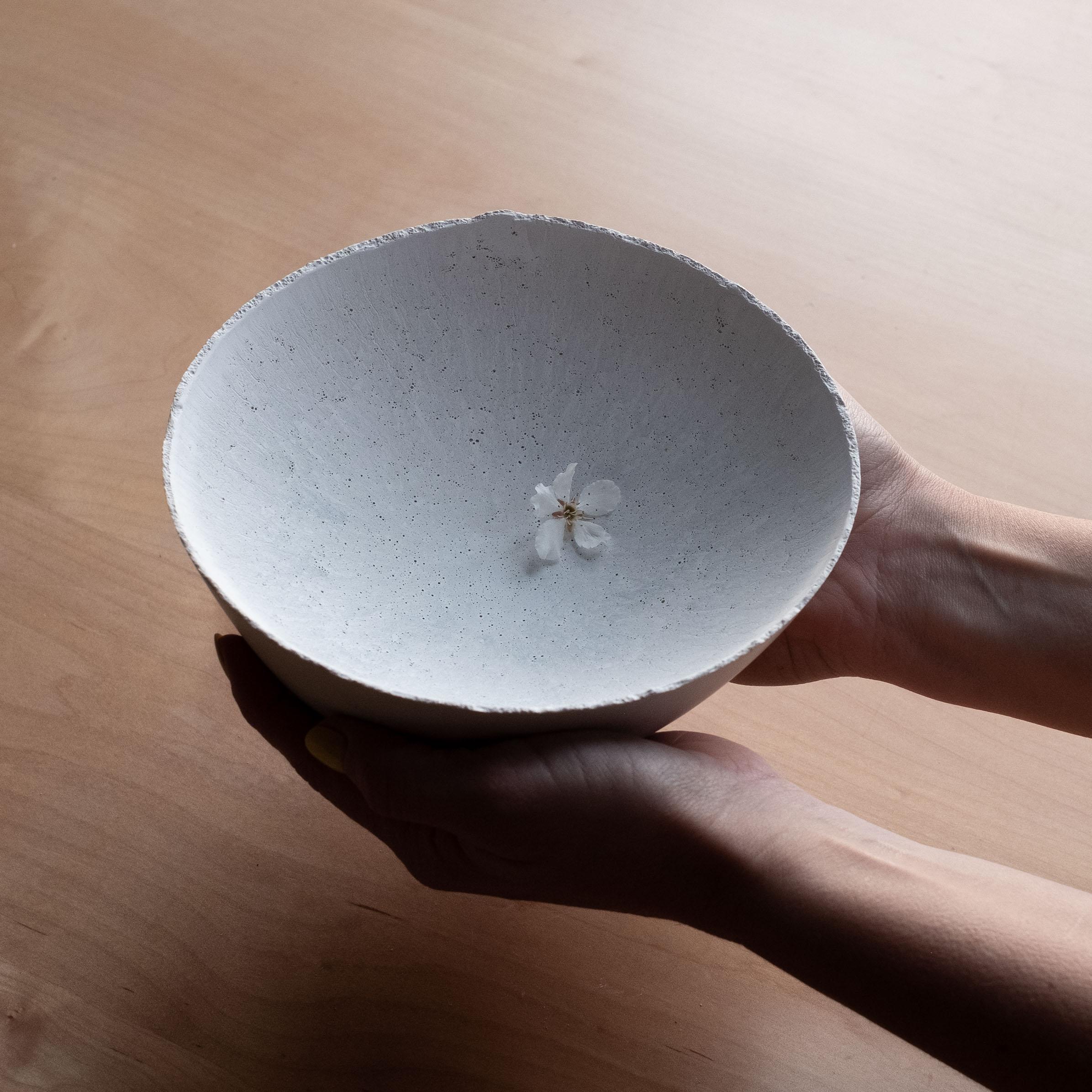 An edition of 150 unique bowls, the concrete Series by UMÉ Studio expresses the tension between heavy concrete and its delicate edge generated by hand pouring. While one assumes concrete should be strong and durable, it is, at its core, fragile.