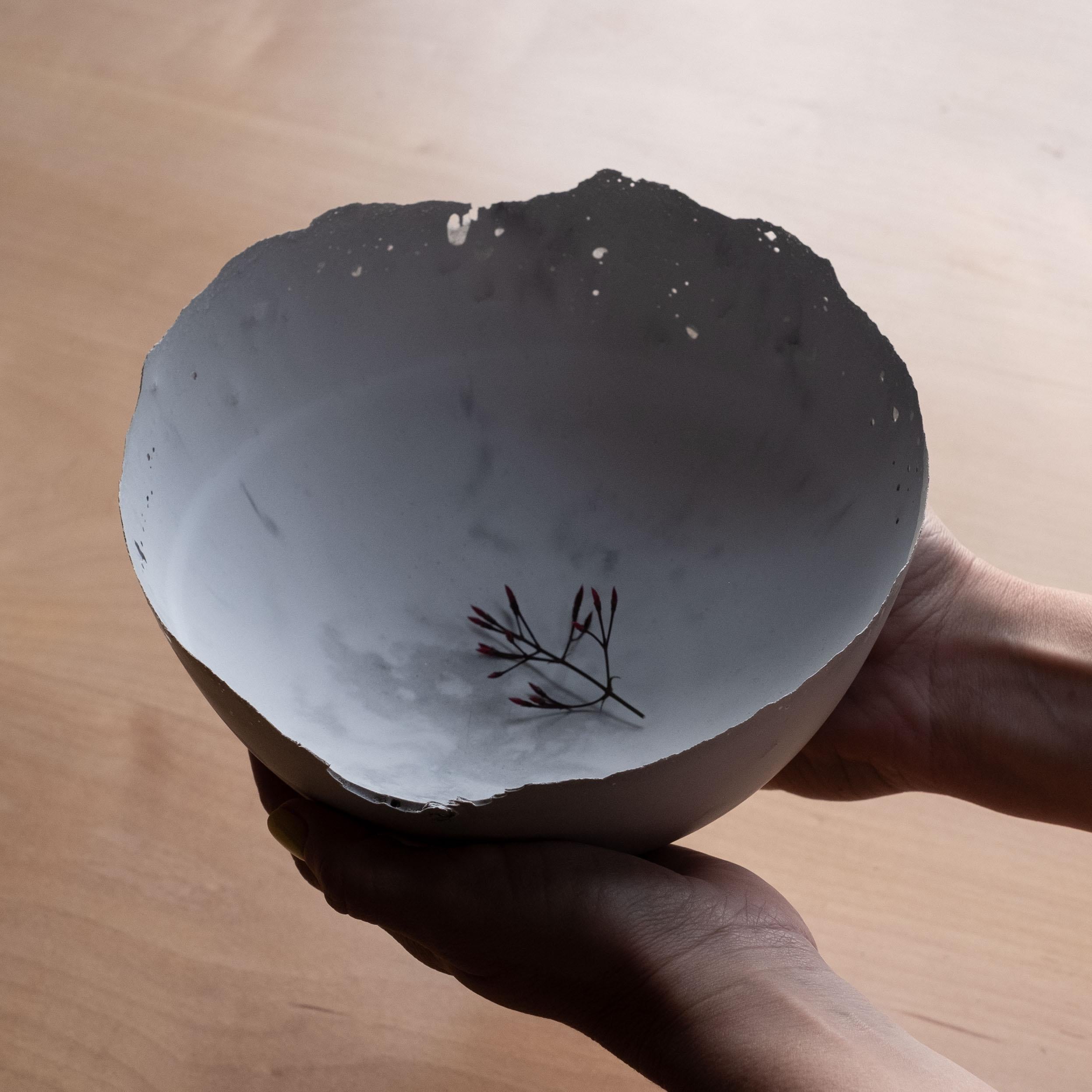 An edition of 150 unique bowls, the concrete Series by UMÉ Studio expresses the tension between heavy concrete and its delicate edge generated by hand pouring. While one assumes concrete should be strong and durable, it is, at its core, fragile.