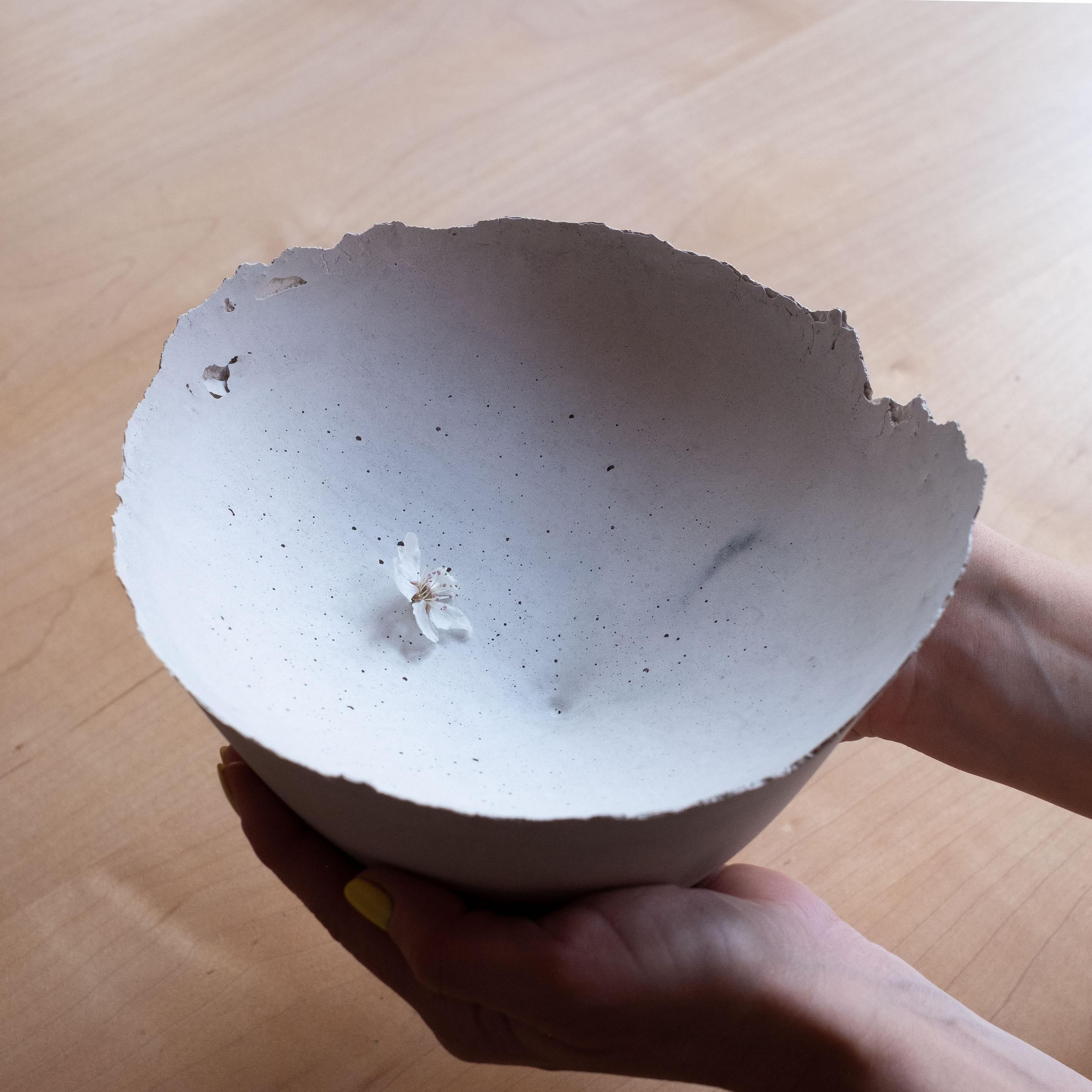 An edition of 150 unique bowls, the concrete Series by UMÉ Studio expresses the tension between heavy concrete and its delicate edge generated by hand pouring. While one assumes concrete should be strong and durable, it is, at its core, fragile.