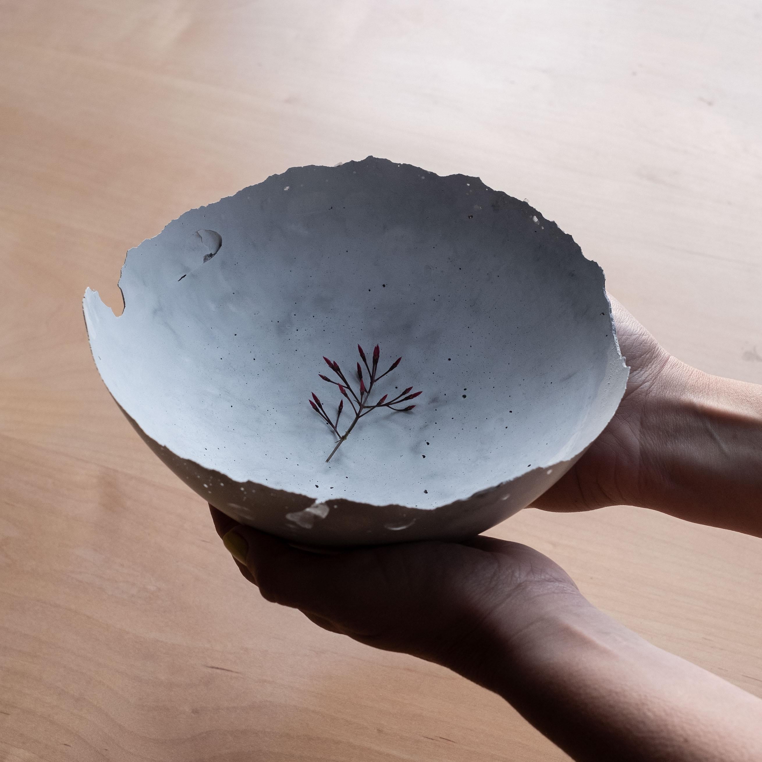 An edition of 150 unique bowls, the concrete Series by UMÉ Studio expresses the tension between heavy concrete and its delicate edge generated by hand pouring. While one assumes concrete should be strong and durable, it is, at its core, fragile.