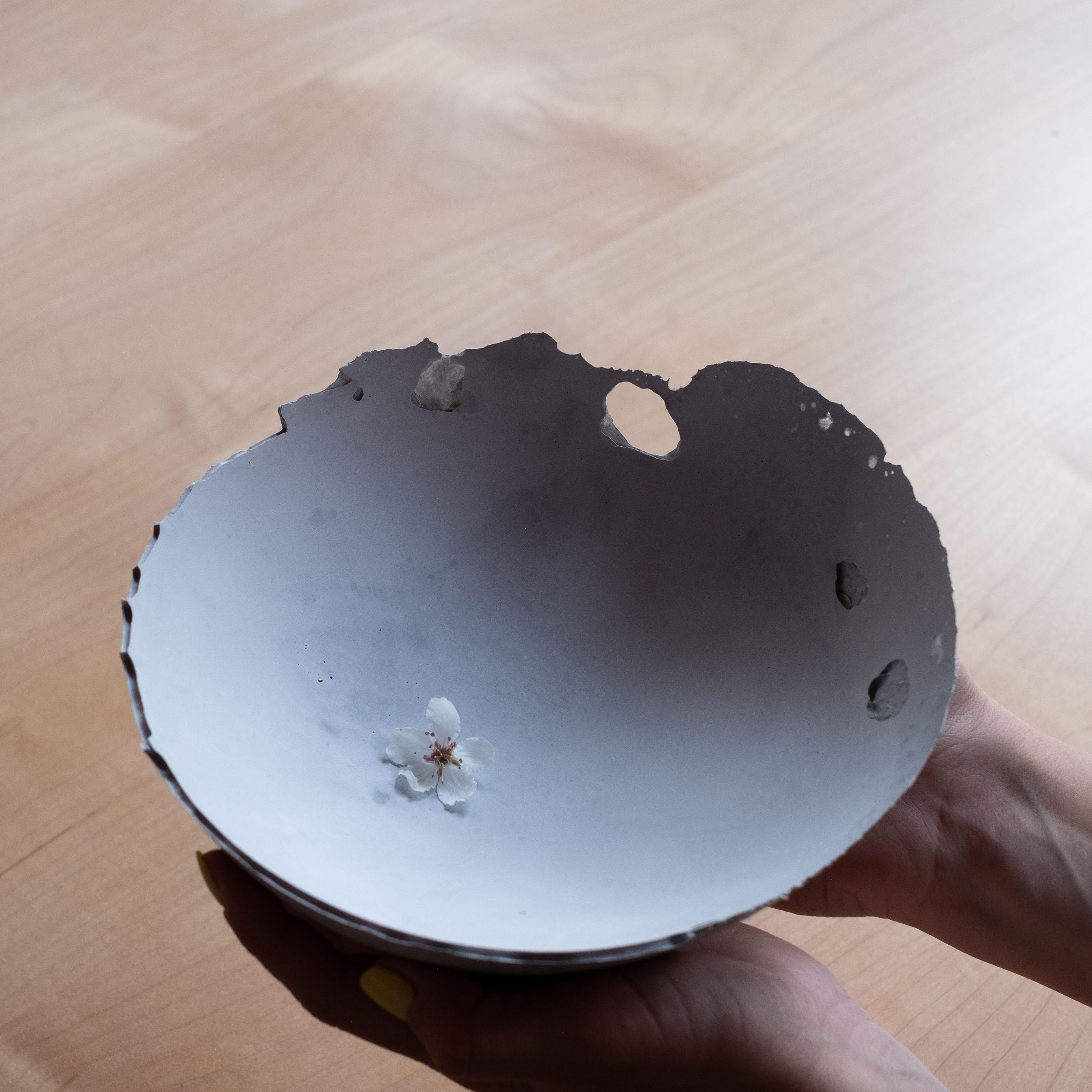 An edition of 150 unique bowls, the concrete Series by UMÉ Studio expresses the tension between heavy concrete and its delicate edge generated by hand pouring. While one assumes concrete should be strong and durable, it is, at its core, fragile.