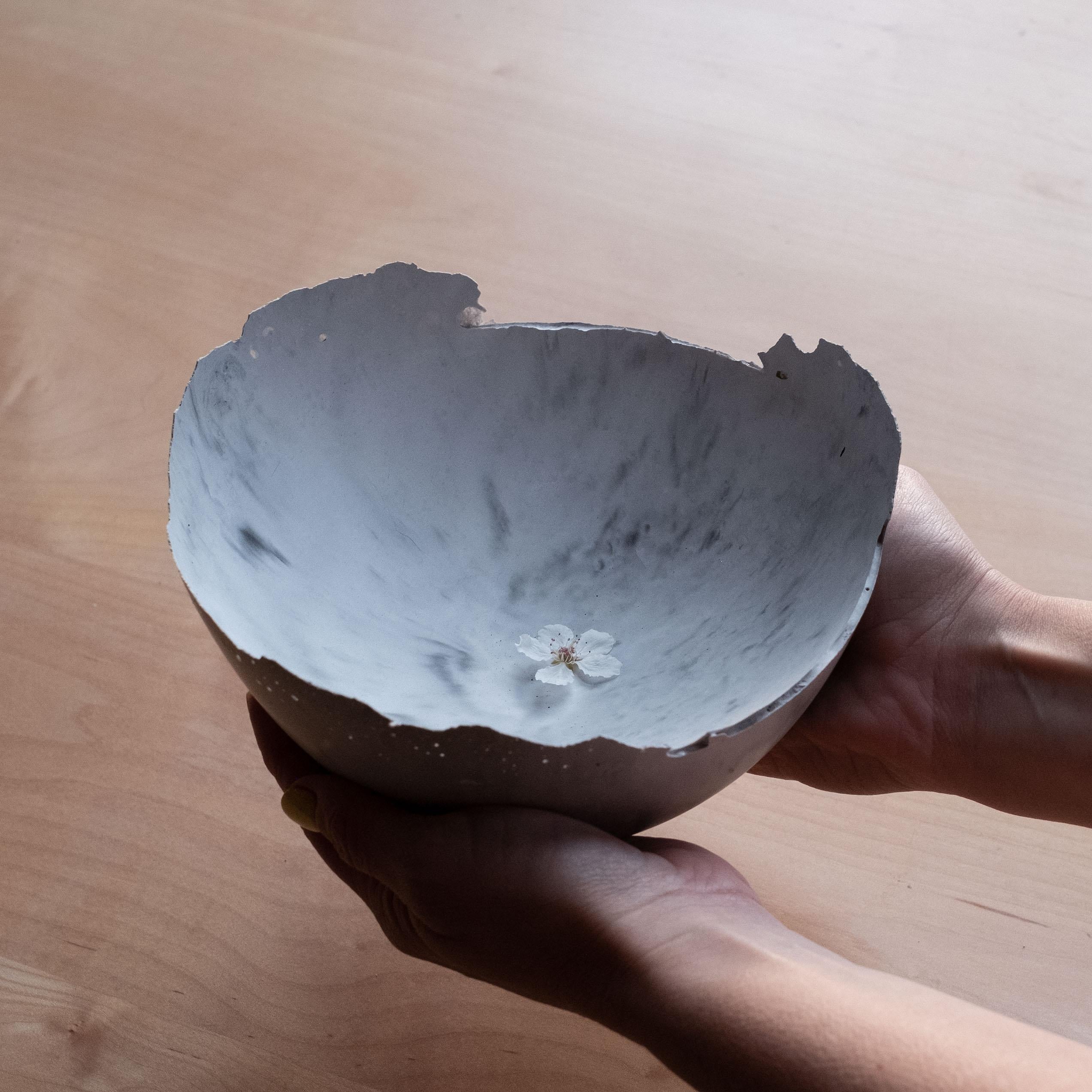 An edition of 150 unique bowls, the concrete Series by UMÉ Studio expresses the tension between heavy concrete and its delicate edge generated by hand pouring. While one assumes concrete should be strong and durable, it is, at its core, fragile.