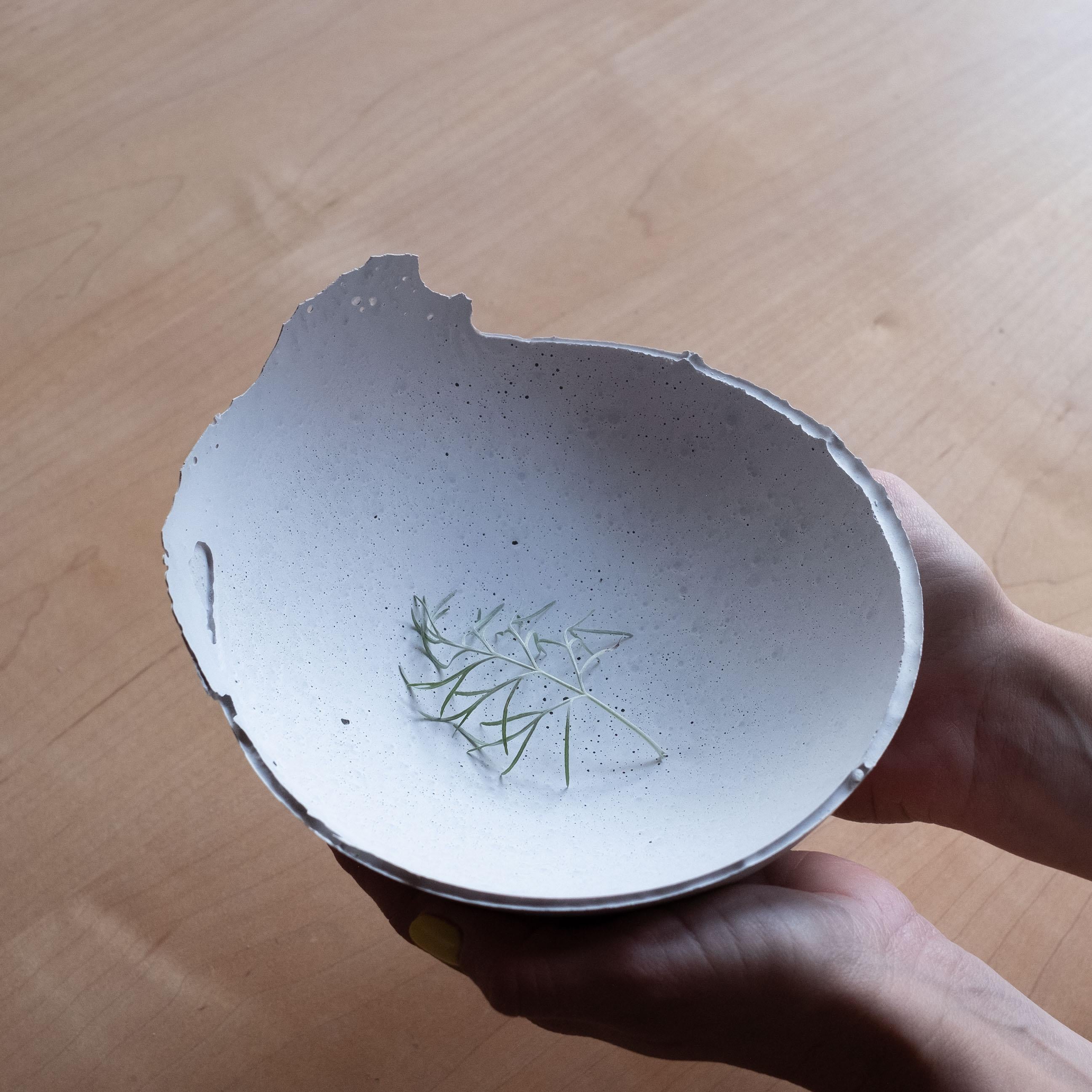 An edition of 150 unique bowls, the concrete Series by UMÉ Studio expresses the tension between heavy concrete and its delicate edge generated by hand pouring. While one assumes concrete should be strong and durable, it is, at its core, fragile.