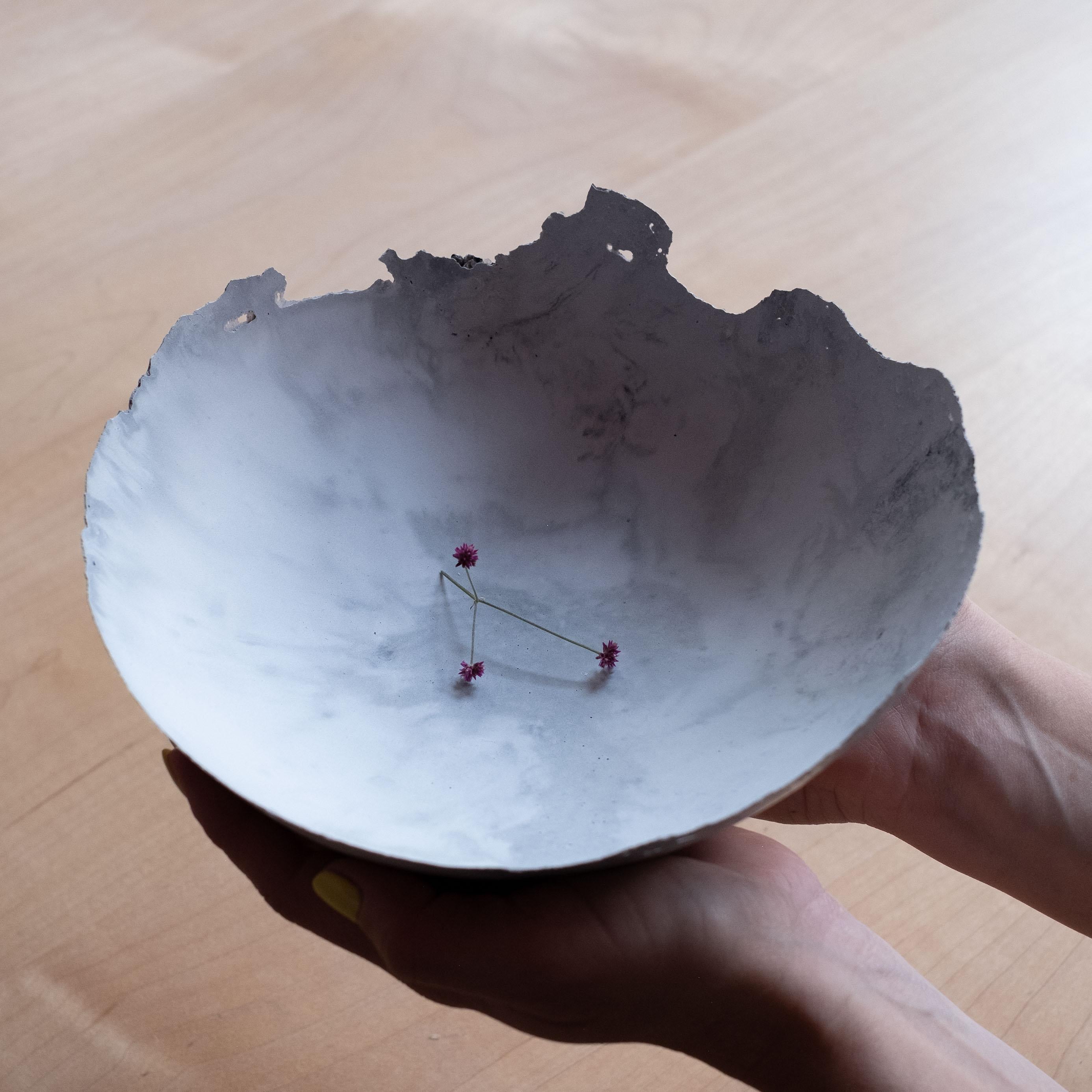 An edition of 150 unique bowls, the concrete Series by UMÉ Studio expresses the tension between heavy concrete and its delicate edge generated by hand pouring. While one assumes concrete should be strong and durable, it is, at its core, fragile.