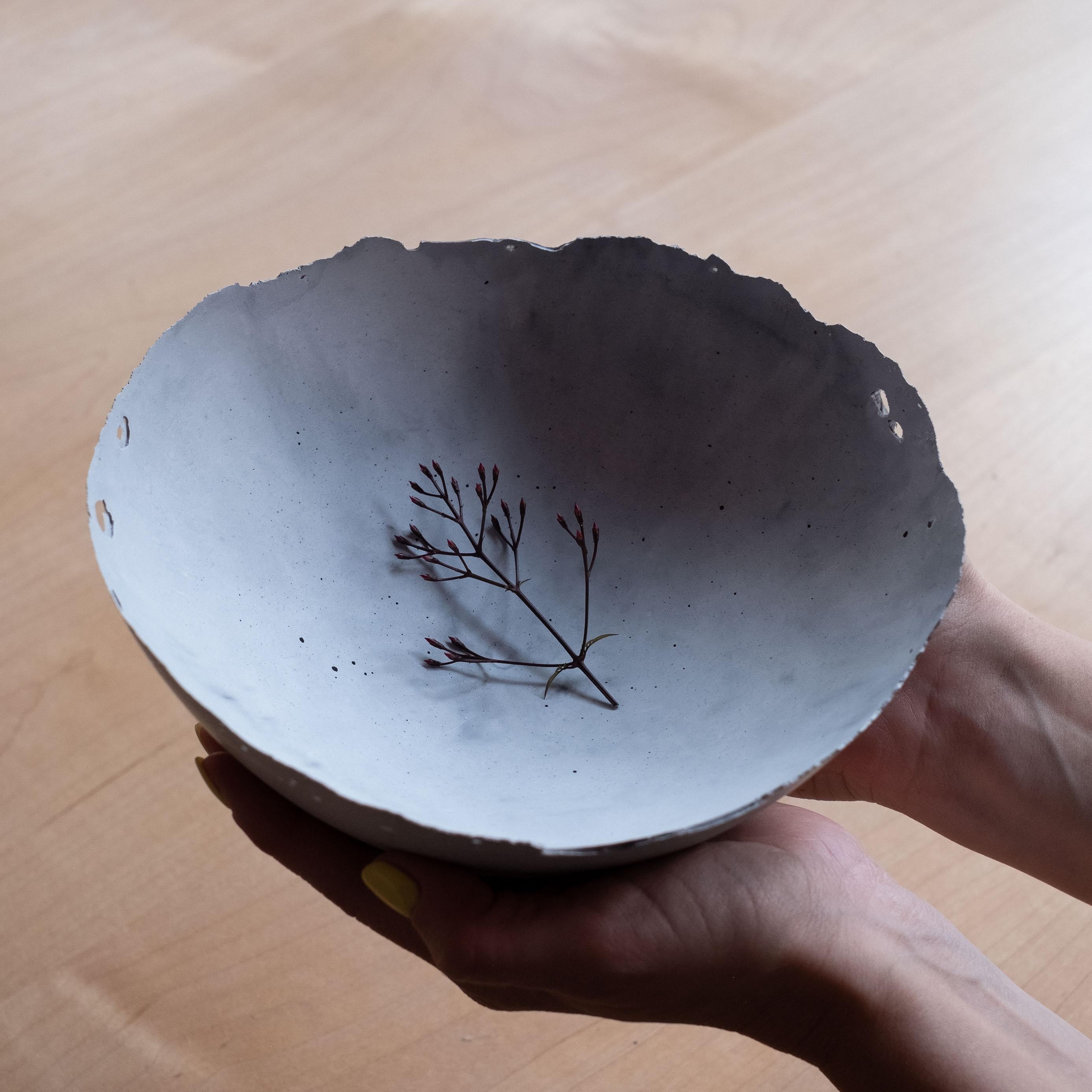 An edition of 150 unique bowls, the concrete Series by UMÉ Studio expresses the tension between heavy concrete and its delicate edge generated by hand pouring. While one assumes concrete should be strong and durable, it is, at its core, fragile.