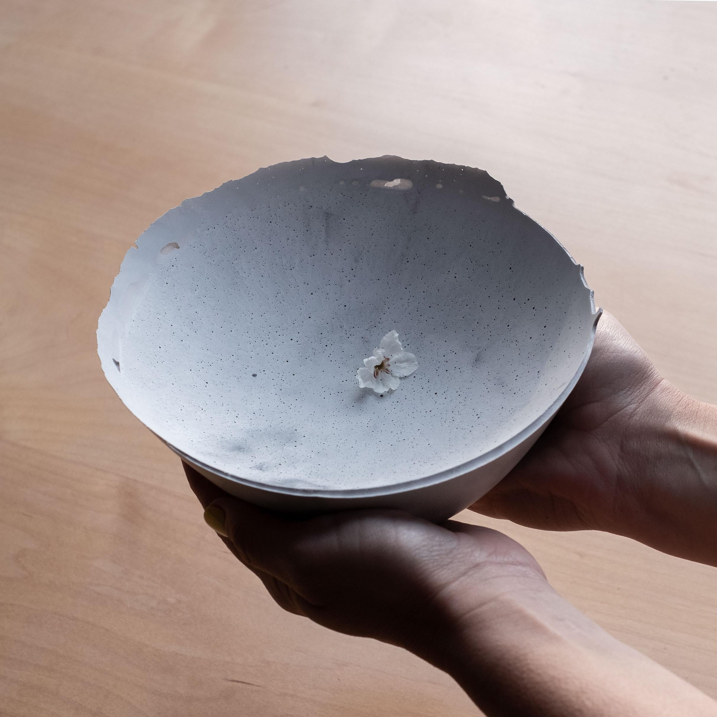 An edition of 150 unique bowls, the concrete Series by UMÉ Studio expresses the tension between heavy concrete and its delicate edge generated by hand pouring. While one assumes concrete should be strong and durable, it is, at its core, fragile.