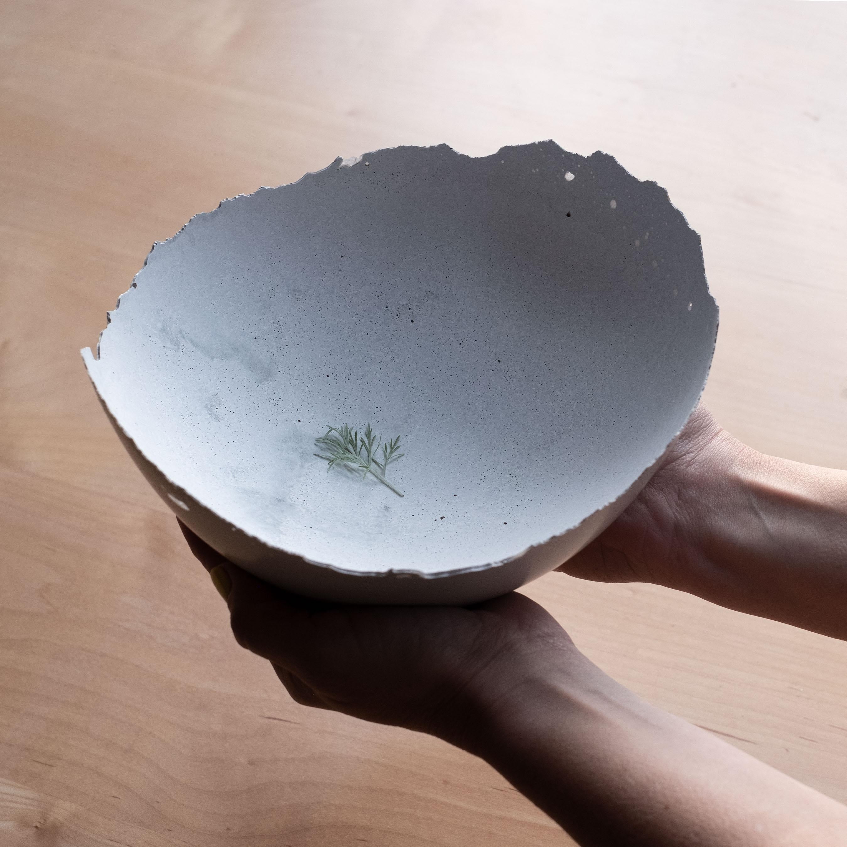 An edition of 150 unique bowls, the concrete Series by UMÉ Studio expresses the tension between heavy concrete and its delicate edge generated by hand pouring. While one assumes concrete should be strong and durable, it is, at its core, fragile.