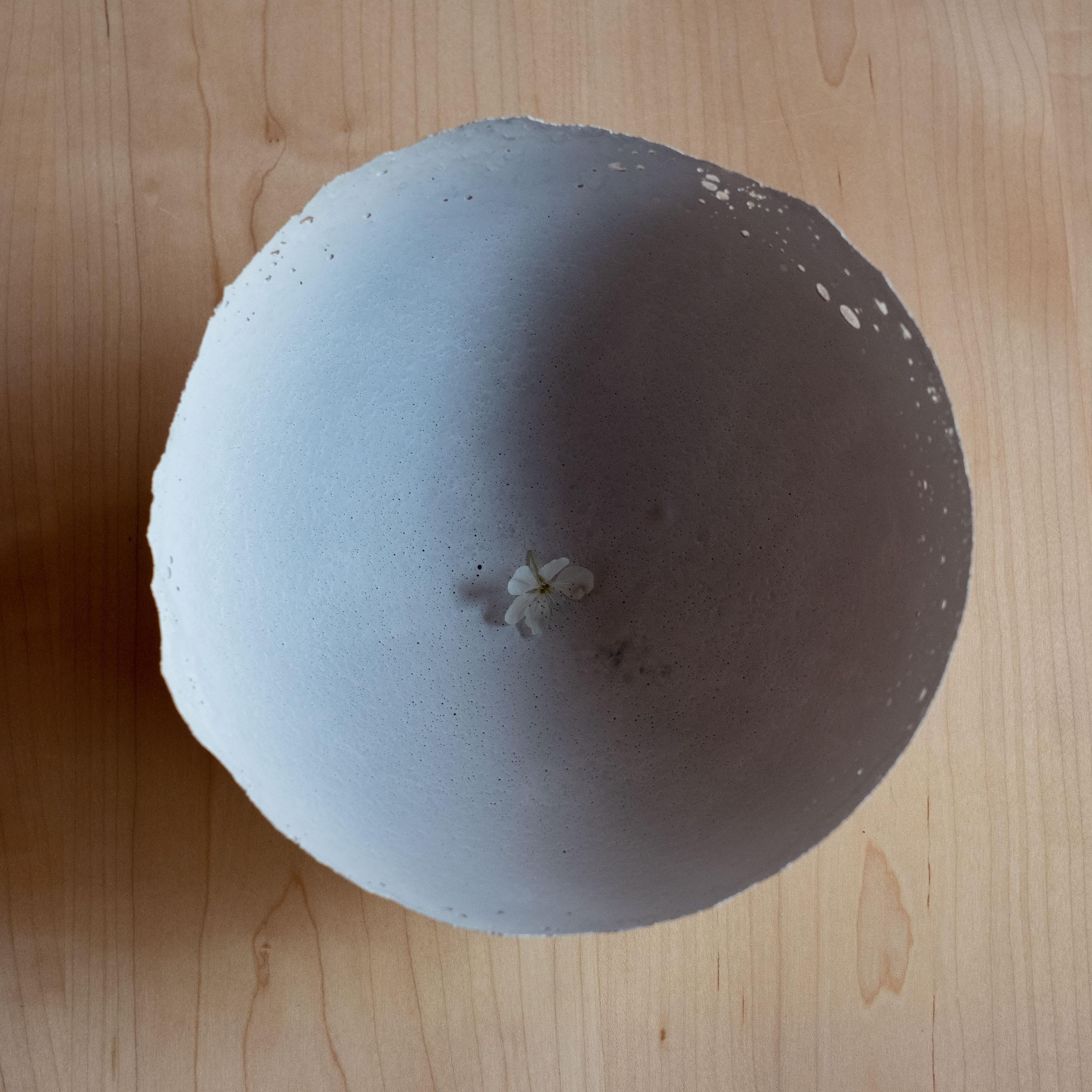 An edition of 150 unique bowls, the concrete Series by UMÉ Studio expresses the tension between heavy concrete and its delicate edge generated by hand pouring. While one assumes concrete should be strong and durable, it is, at its core, fragile.