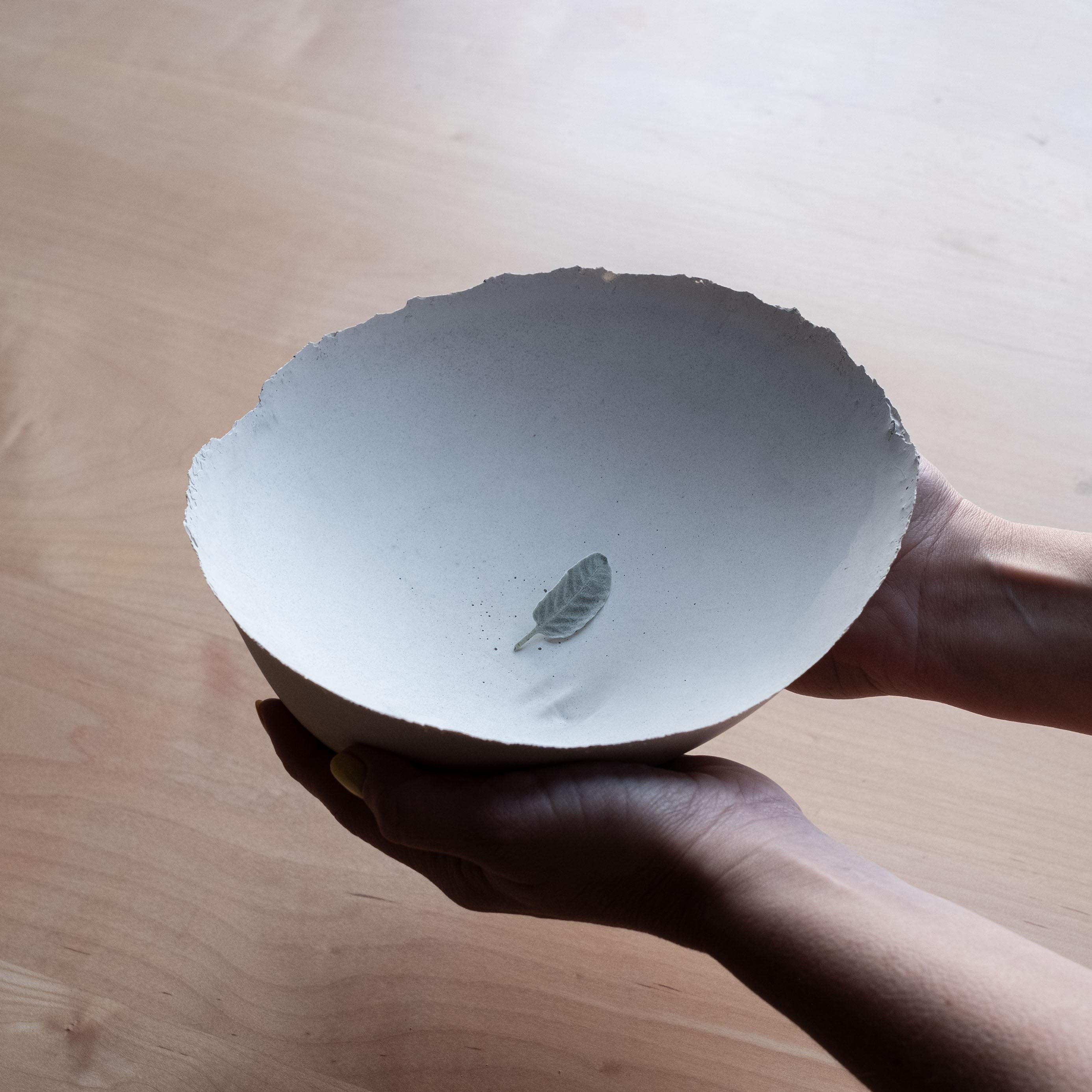 An edition of 150 unique bowls, the concrete Series by UMÉ Studio expresses the tension between heavy concrete and its delicate edge generated by hand pouring. While one assumes concrete should be strong and durable, it is, at its core, fragile.