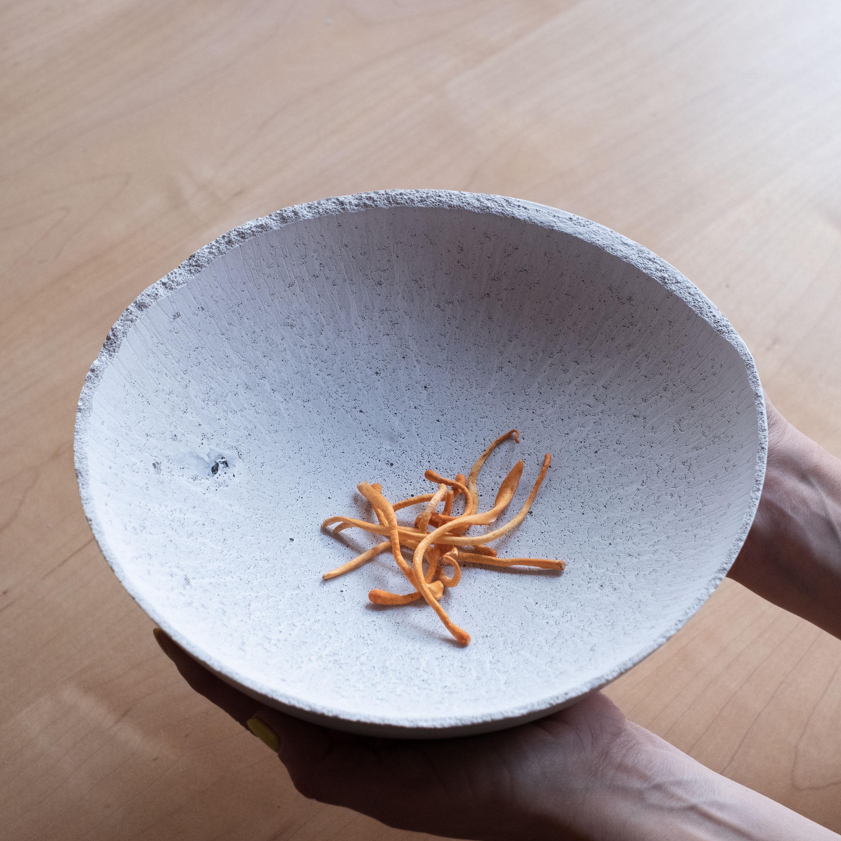 An edition of 150 unique bowls, the concrete Series by UMÉ Studio expresses the tension between heavy concrete and its delicate edge generated by hand pouring. While one assumes concrete should be strong and durable, it is, at its core, fragile.