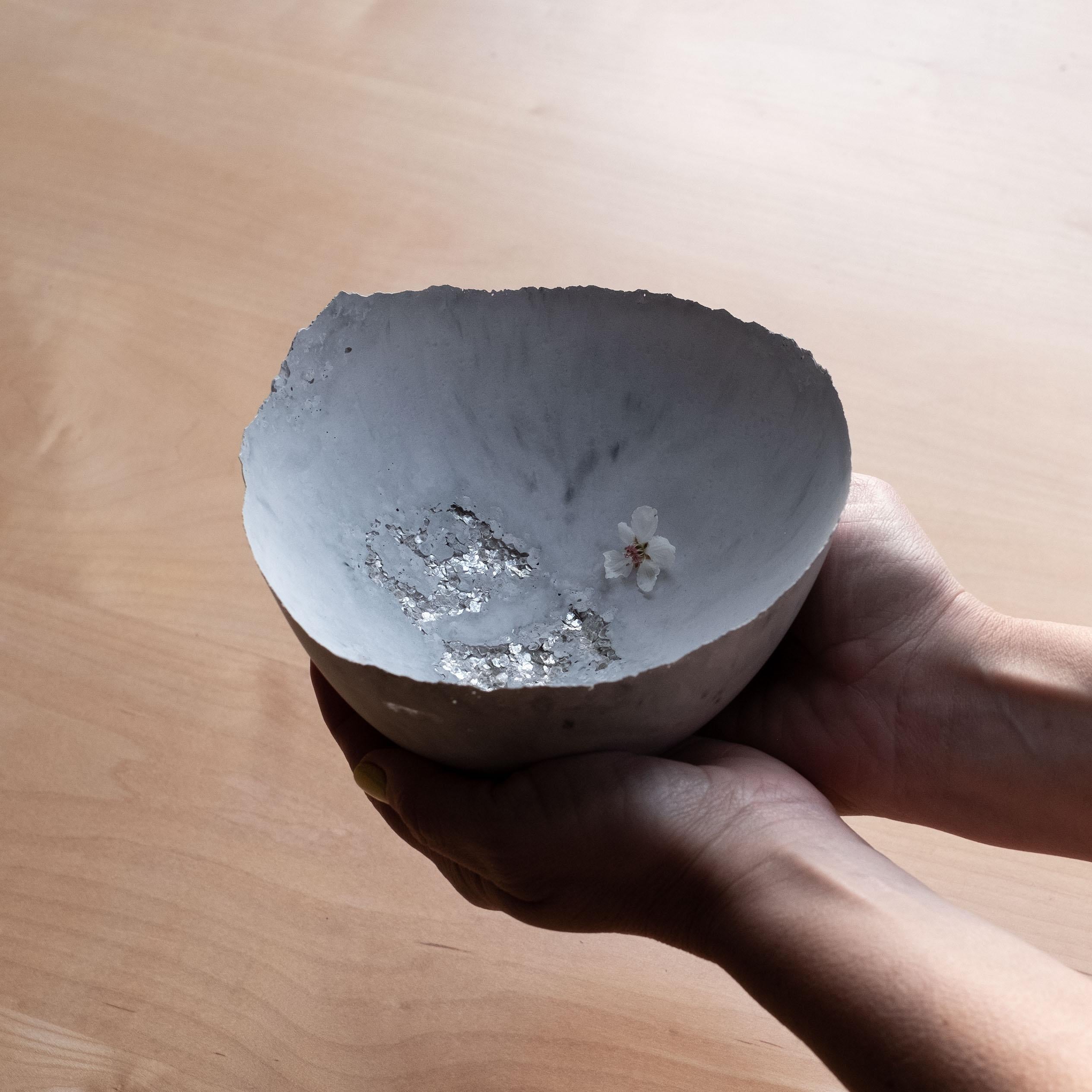 An edition of 150 unique bowls, the concrete Series by UMÉ Studio expresses the tension between heavy concrete and its delicate edge generated by hand pouring. While one assumes concrete should be strong and durable, it is, at its core, fragile.