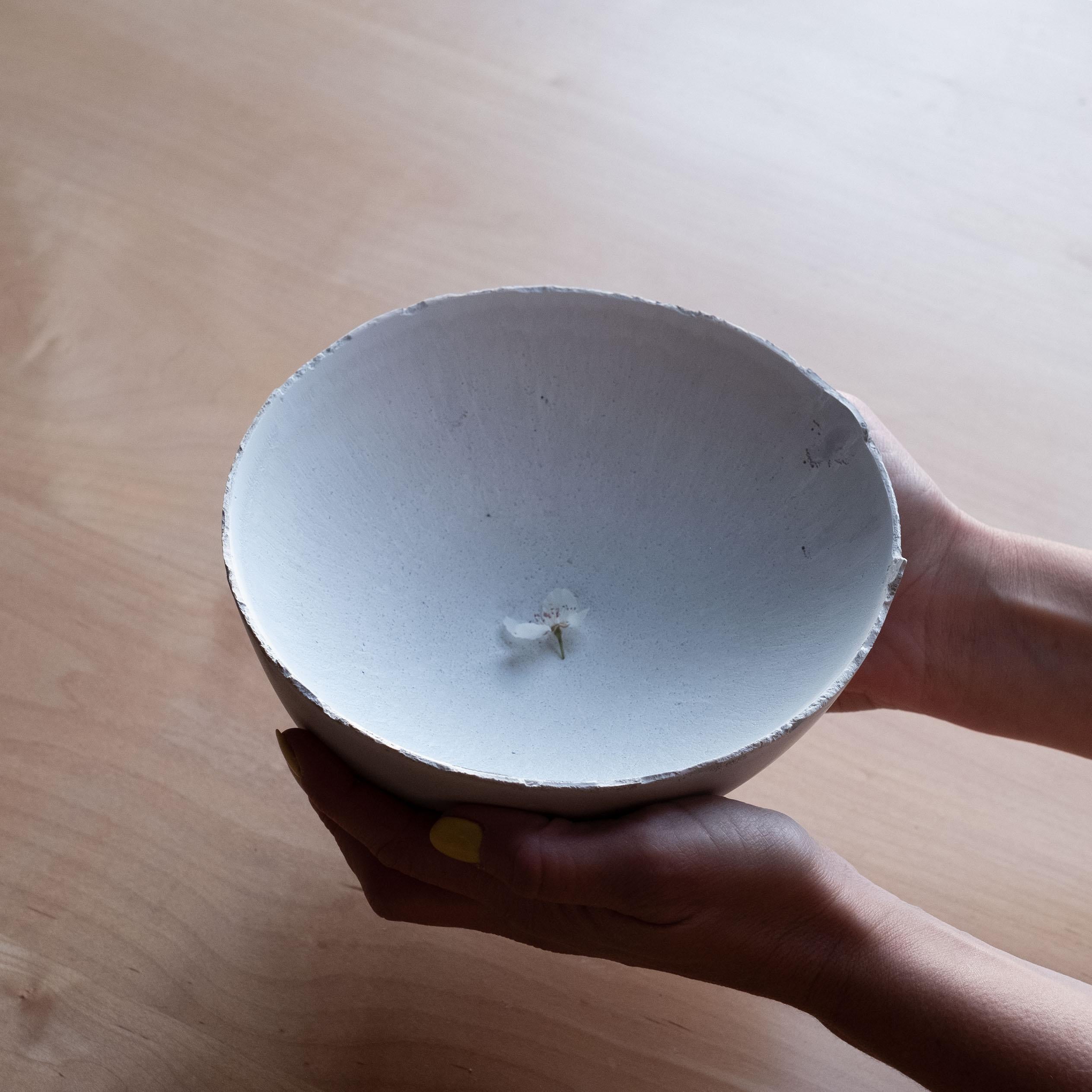 An edition of 150 unique bowls, the concrete Series by UMÉ Studio expresses the tension between heavy concrete and its delicate edge generated by hand pouring. While one assumes concrete should be strong and durable, it is, at its core, fragile.