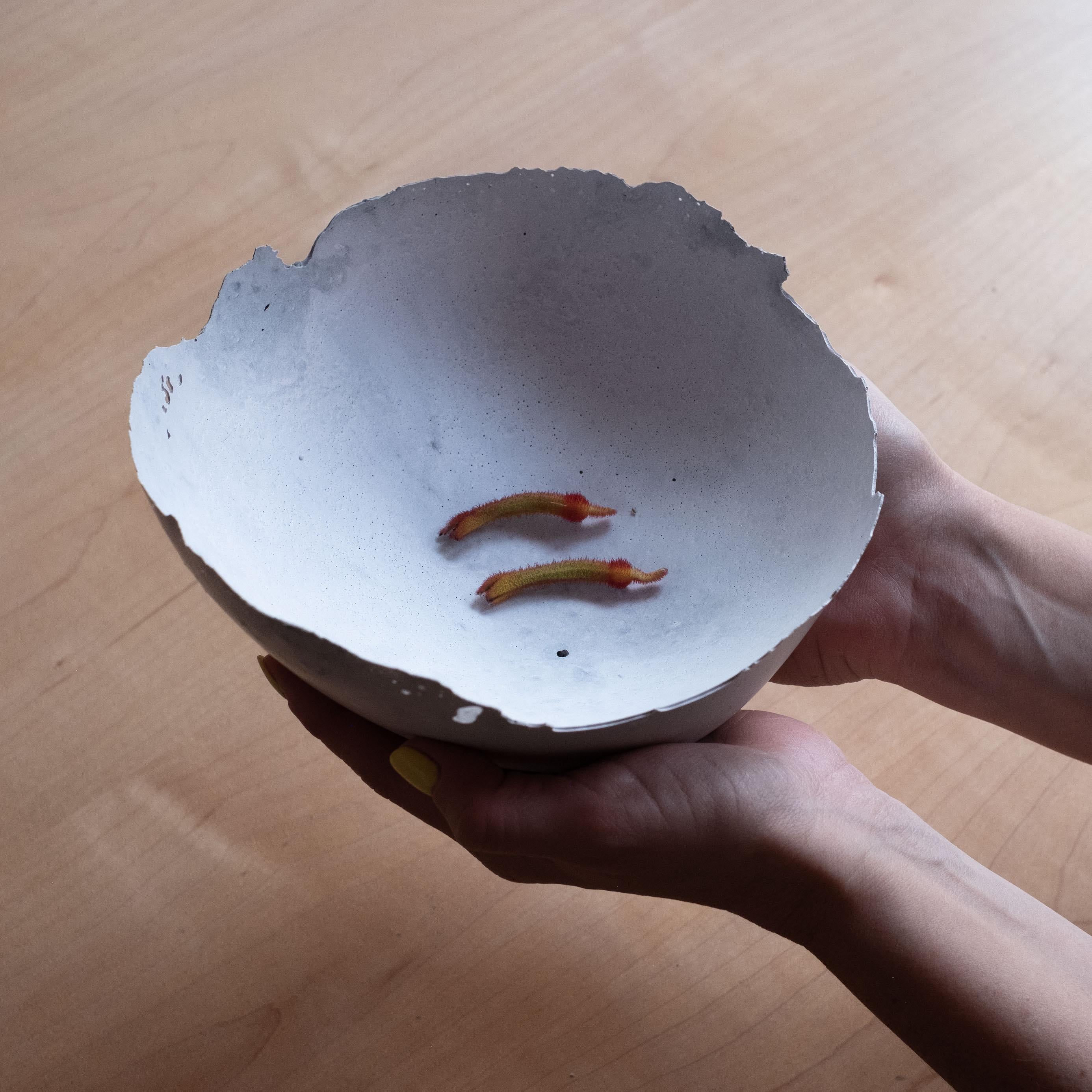 An edition of 150 unique bowls, the concrete Series by UMÉ Studio expresses the tension between heavy concrete and its delicate edge generated by hand pouring. While one assumes concrete should be strong and durable, it is, at its core, fragile.